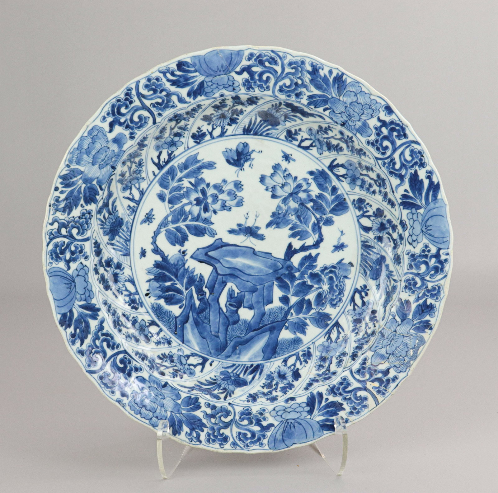 Chinese Blue & Wite Porcelain Shallow Bowl: Chinese blue & white porcelain shallow bowl, rocky landscape with insects, Buddhist symbol mark to base, 14-3/4" dia x 2" h, extensive repair