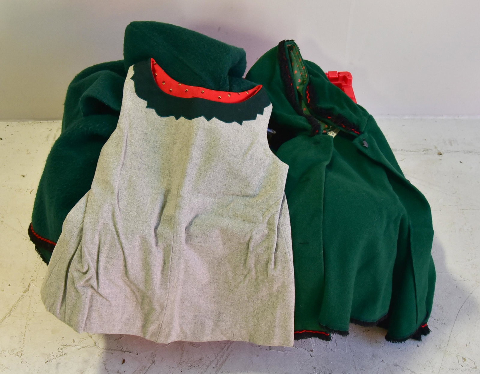 Large Grouping Incl. Childrens German Sweaters: Large grouping incl. childrens German sweaters, grouping is comprised of embroidered hats, dresses, skirts, cloaks, blouses, embroidered waist purse and more. All items as-is