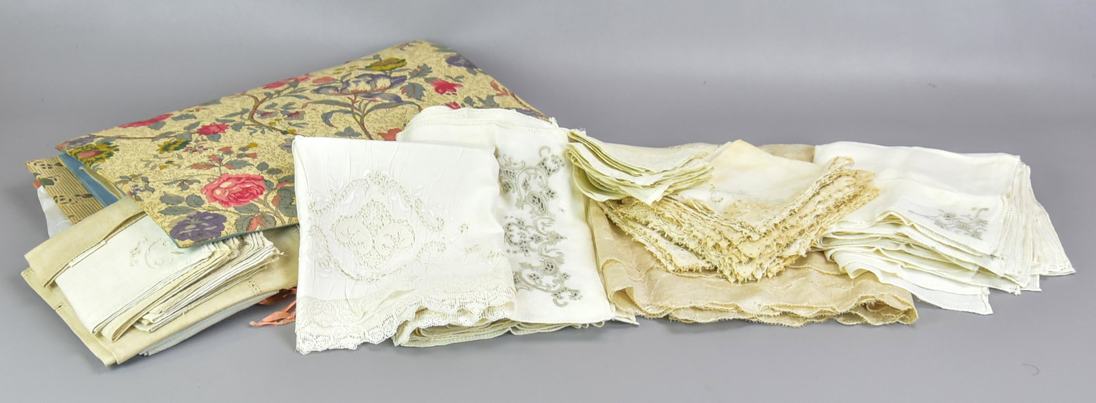 Antique and Vintage Linen Grouping: Antique and vintage linen grouping to include (12) corner embroidered napkins, with repairs, 15" x 16", (8) matched embroidered placemats, 15" x 11-1/2", some holes and wear, (5) lace cornered napkins