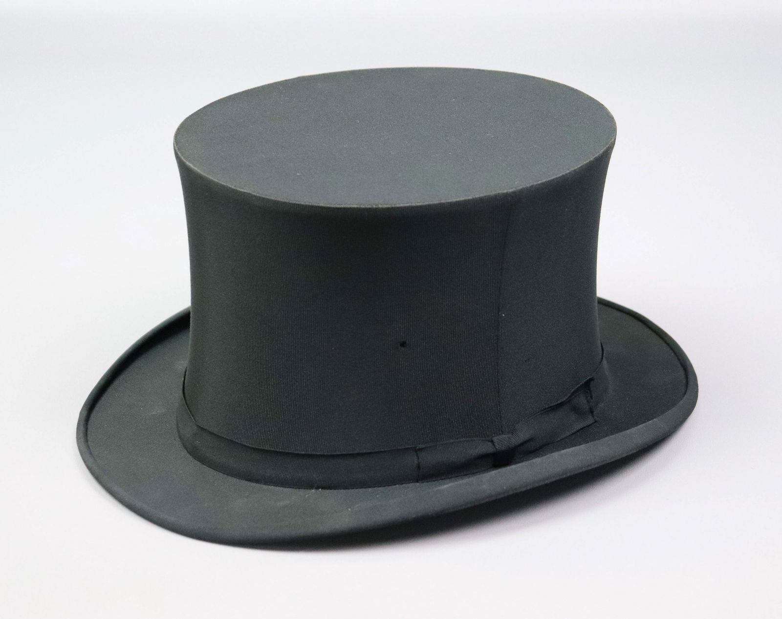 Stetson Grosgrain Collapsible Top Hat: Stetson grosgrain collapsible top hat, John B. Stetson Co., 8-1/4"x6-1/2", fully functional, 1/8" hole in material at side.