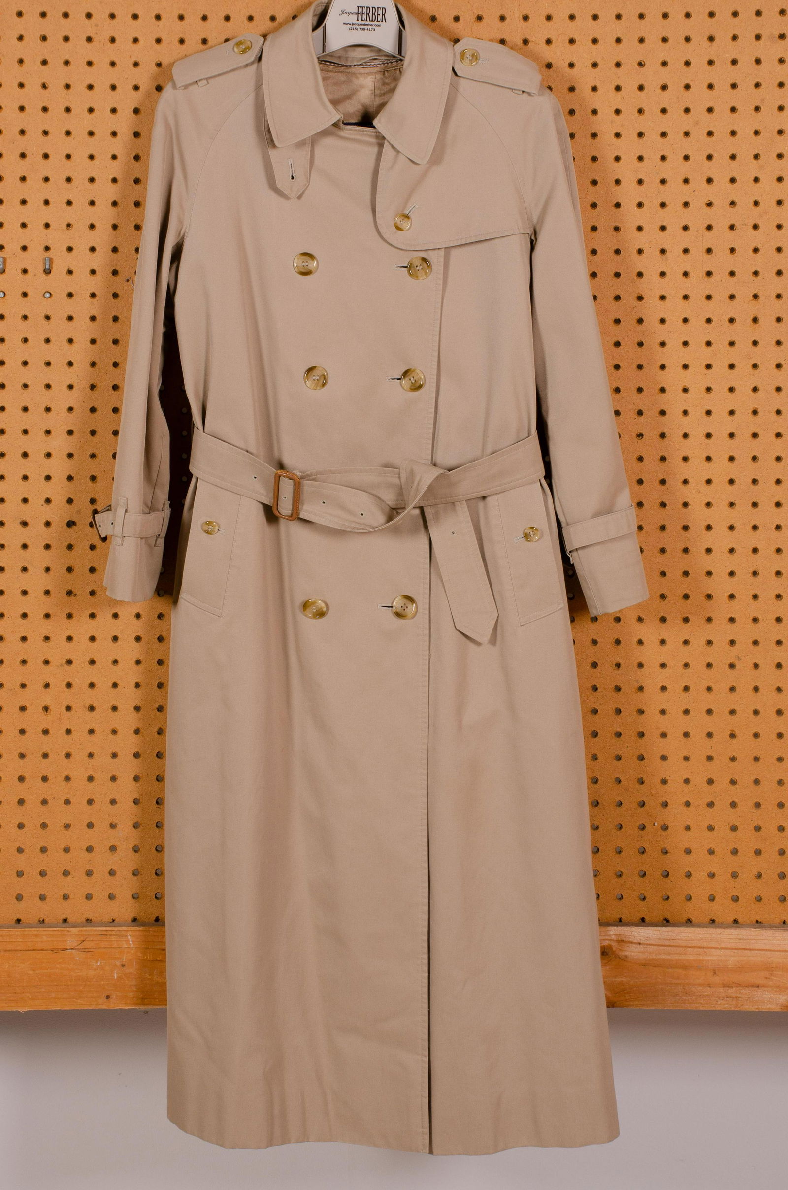Burberrys' Ladies Trench Coat: Burberrys' ladies trench coat in cotton with double breasted button front, original belt, plaid lining and wool plaid zip out lining, very good condition save small stain at inside, 34" bust, 32" shou