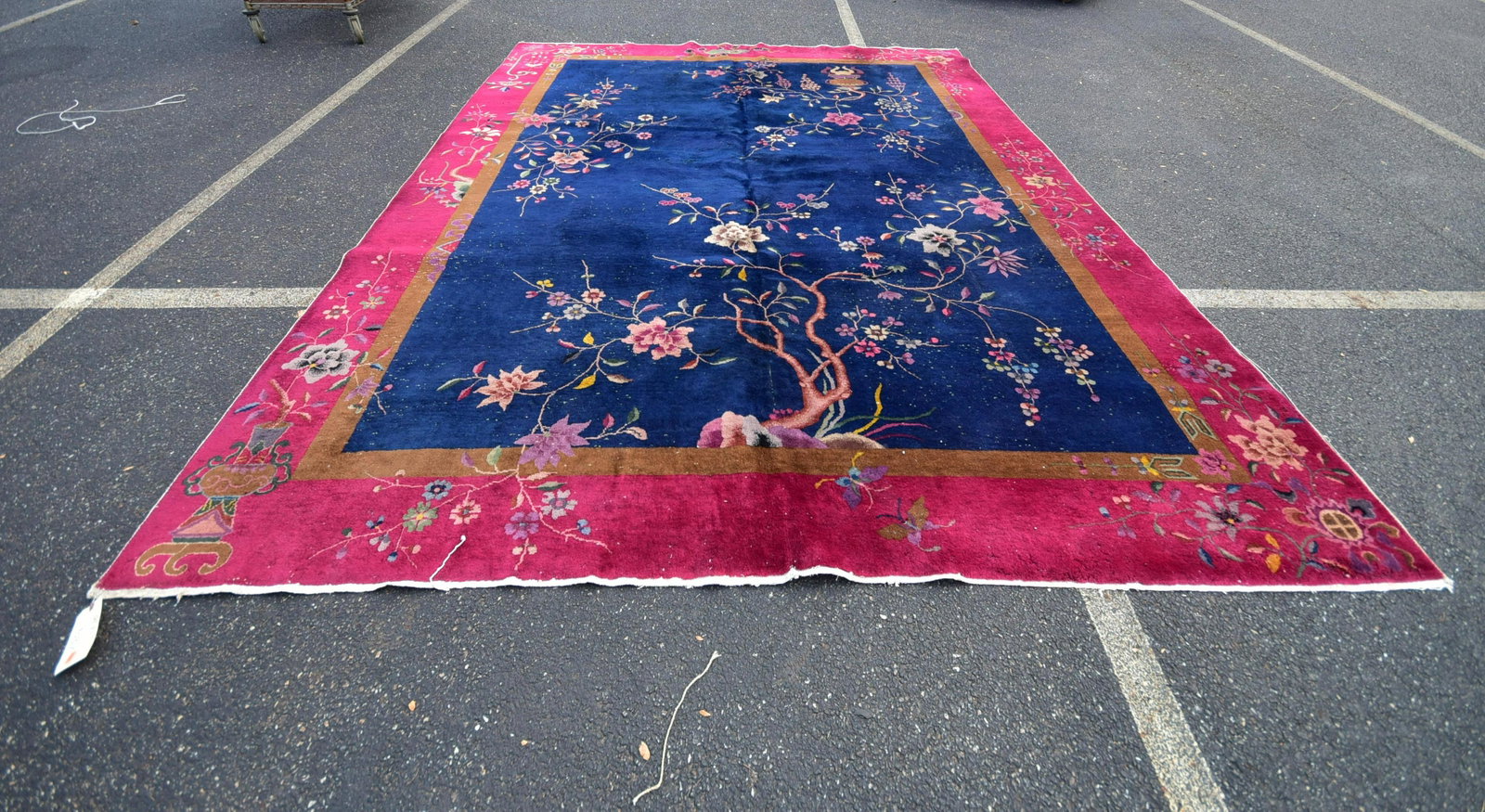 9'1" x 11'7" Chinese Art Deco Rug: 9'1" x 11'7" Chinese Art Deco Rug, good condition, some moth damage, Moth damage mostly in magenta border areas, present in blue field not as noticeable. Seam inside at one sixth the width.