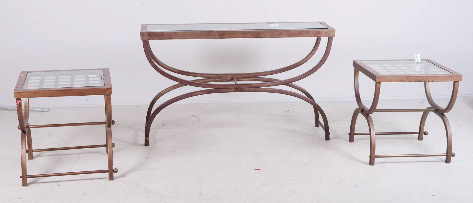 (3) pc Distressed painted glass top curule table set: (3) pc painted glass top curule form table set, c/o two side tables, console table, some glass with damage, 29"h x 48"w