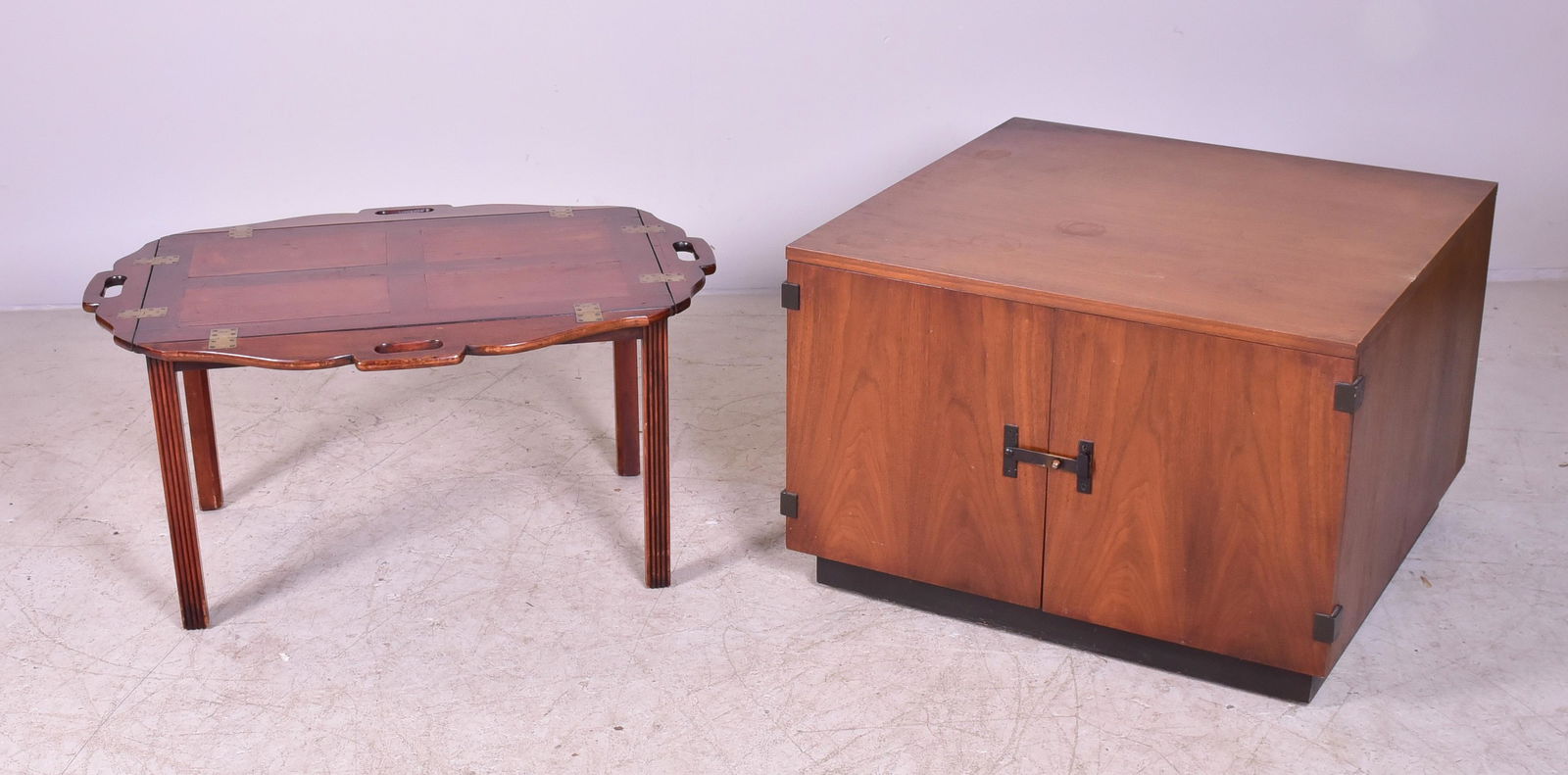 Asian style walnut two door coffee table: Asian style walnut two door coffee table, along with Chippendale style butler's table, largest 21"h x 30-1/2"w