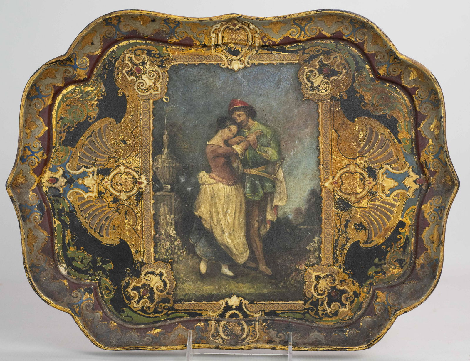 Gilt Painted Papier Mache Tray: Gilt painted papier mache tray depicting romantic scene at center with gilt shell and scroll painted frame surround, unsigned, 16-1/2"x12-1/4"