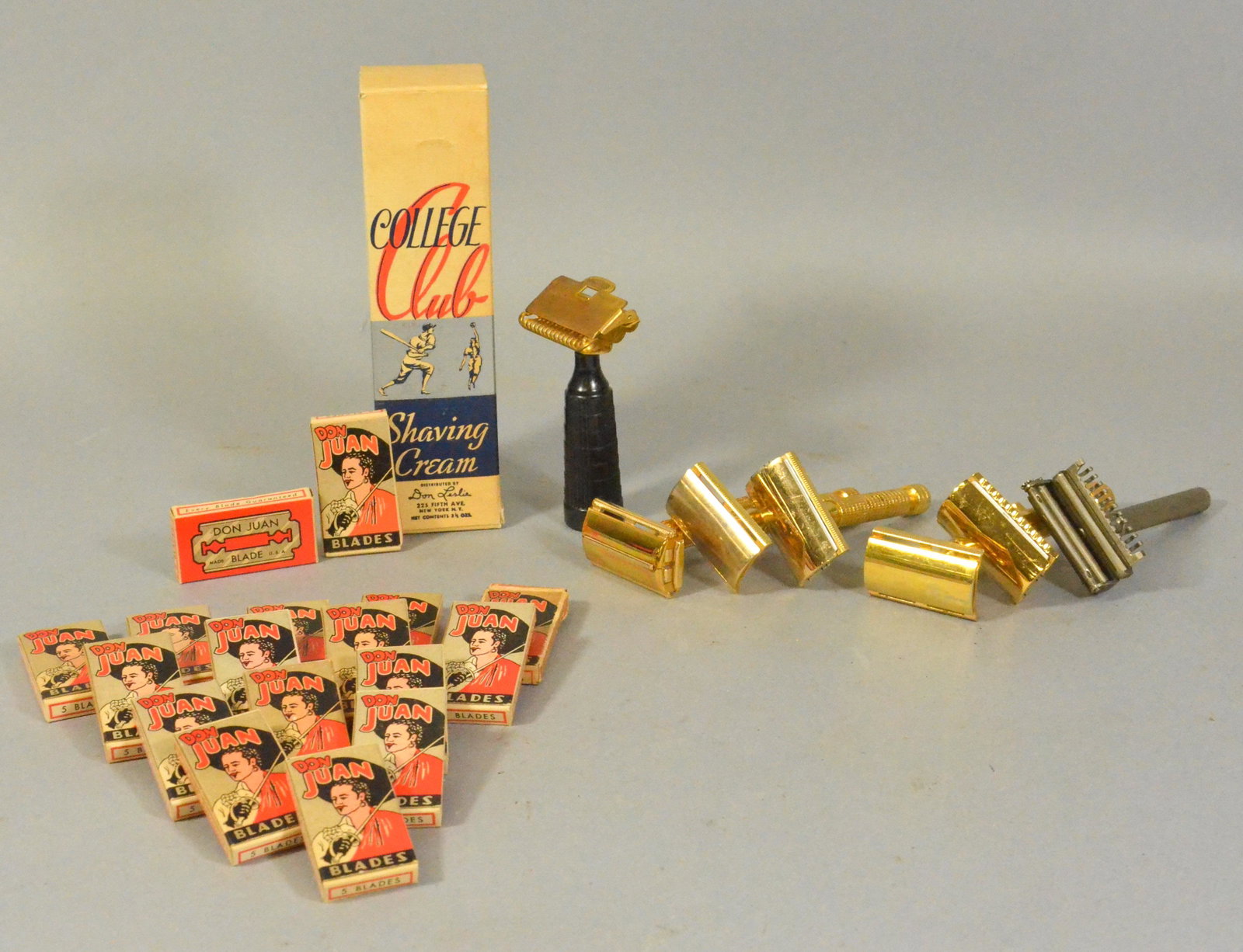 (7) Safety Razors, Don Juan Blades and Shave Cream: (7) Safety razors, Don Juan blades and shave cream to include Merkur gold tone, (4) gold tone star brand razors, (1) with bakelite handle, Gillette gold tone razor and Valet Auto Strop safety razor, a
