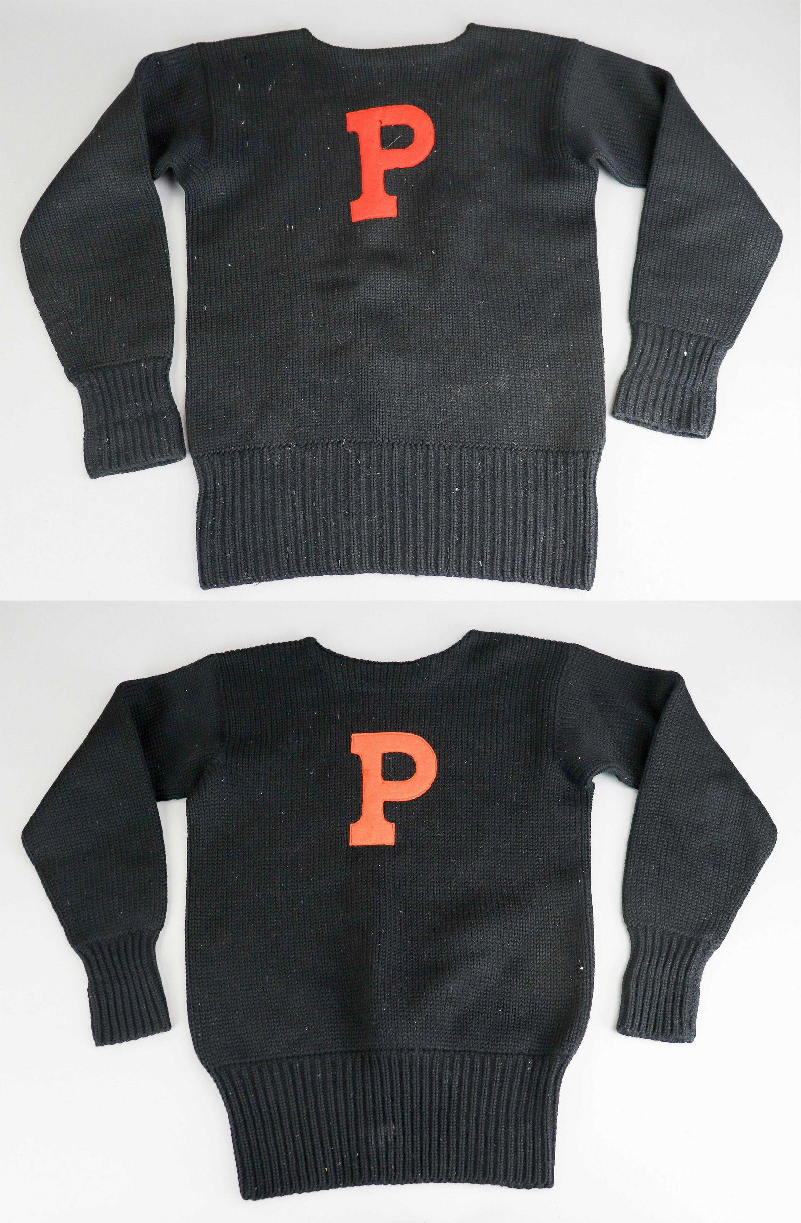 (2) 1940's Princeton Letter Sweaters: (2) 1940's Princeton Letter Sweaters, black wool bodied with orange felt P, (1) unbranded, (1) Indian Brand Goodman Knitting Co. Boston, 36" bust and 38" bust, some moth bites