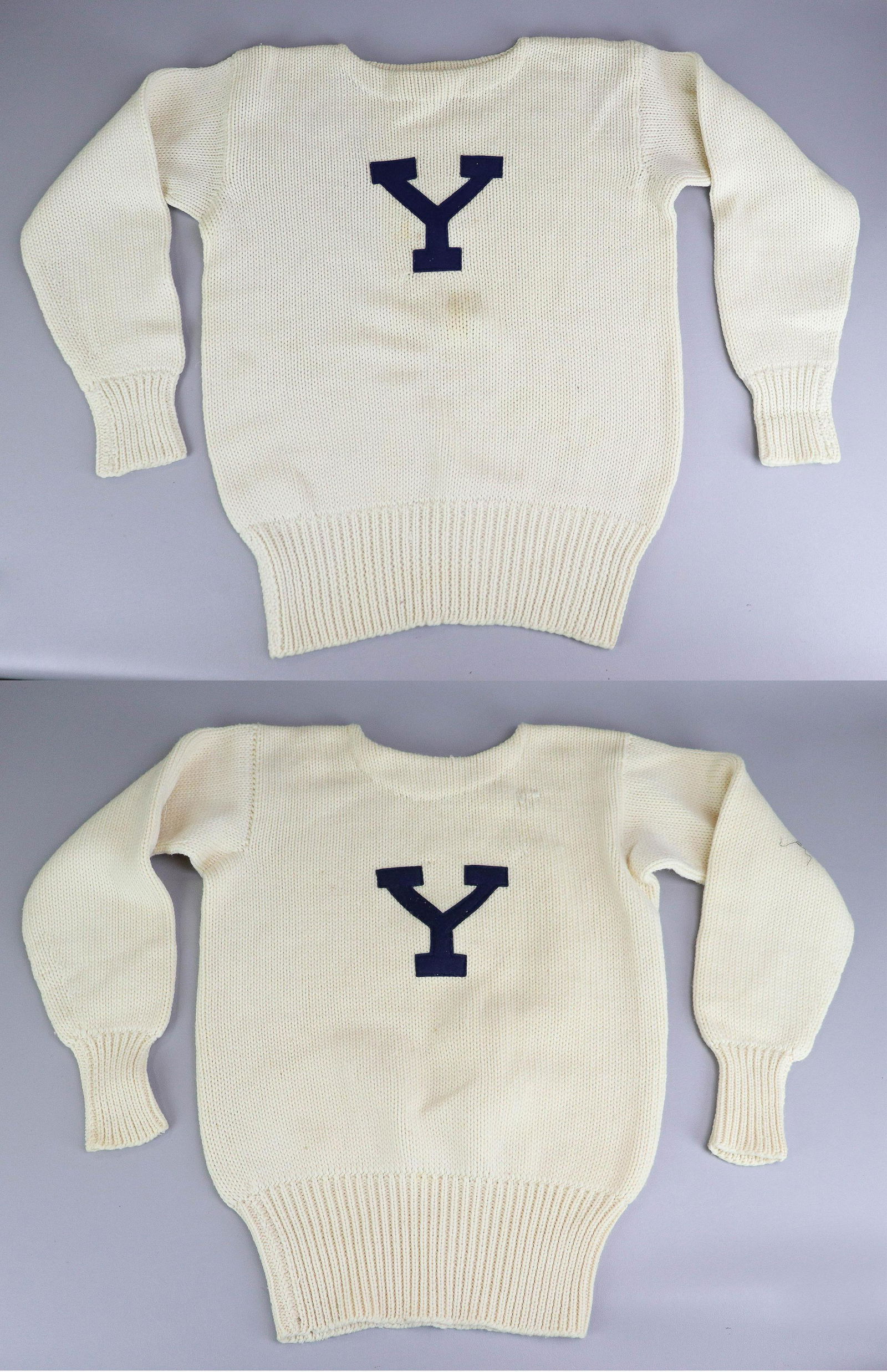 (2) 1950's Yale Letter Sweaters: (2) 1950's Yale letter sweaters to include Yale Stadium sweater, 40" bust, discoloration to front and Yale Co-op sweater, some repairs, 40" bust