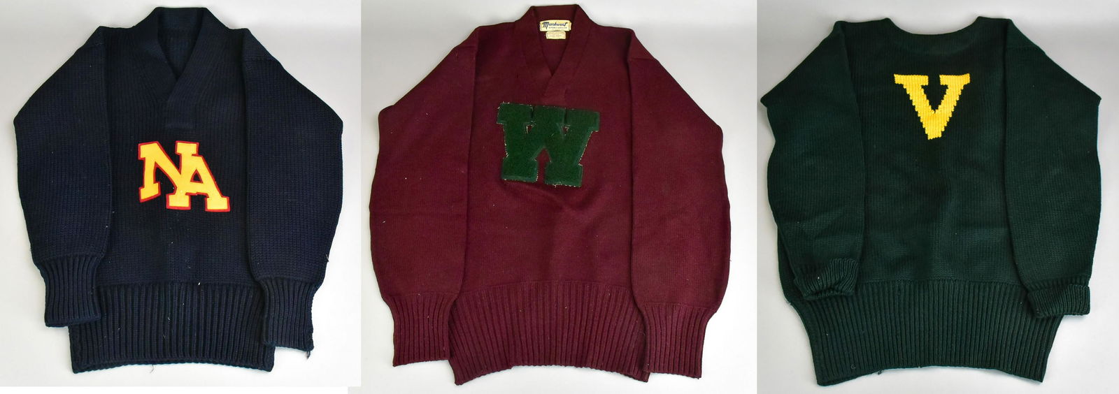 (3) Vintage Letter Sweaters: (3) Vintage letter sweaters to include unbranded wool 'V' sweater, 38" bust, Markwort Sportswear St. Louis M.O. 'W' sweater, Washington Univ., some holes and moth bites, 40" bust and North American v-