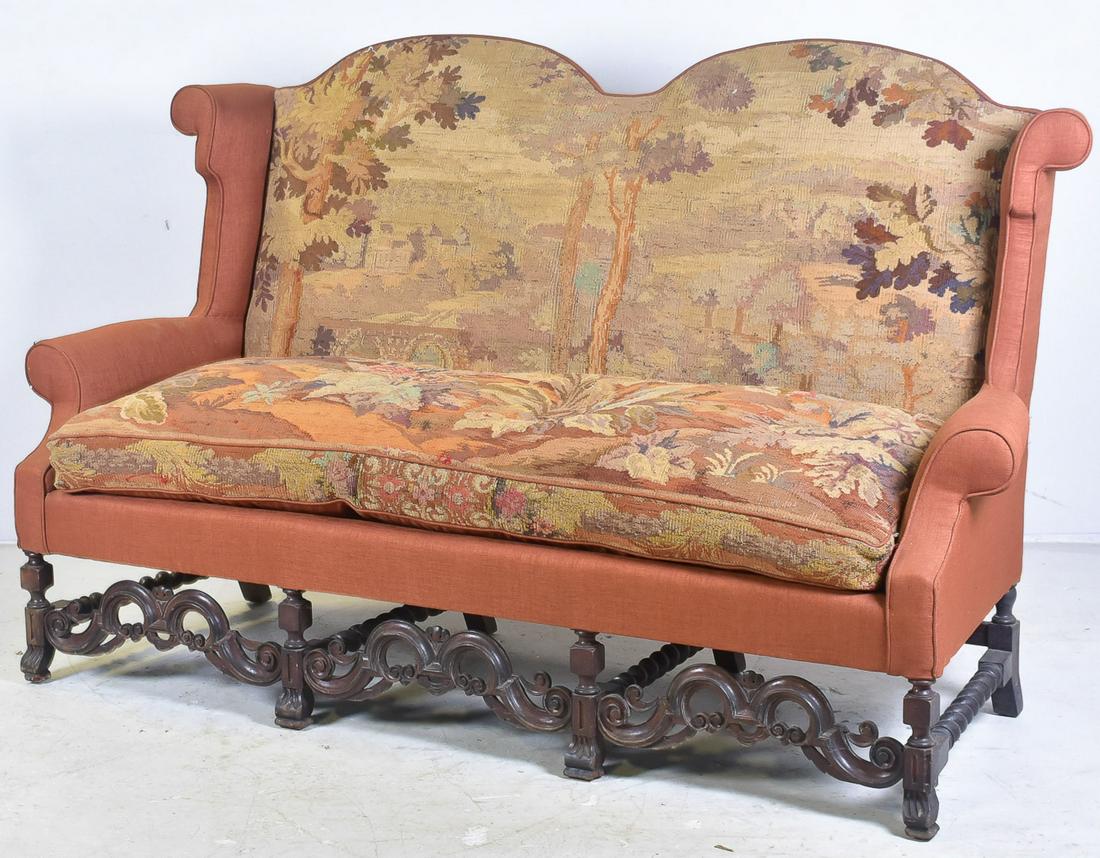 19th c Baroque style double back sofa: 19th c Baroque style double back sofa, with scenic tapestry upholstery, pierced carved stretcher, in the four legged front, 80"w x 49"h