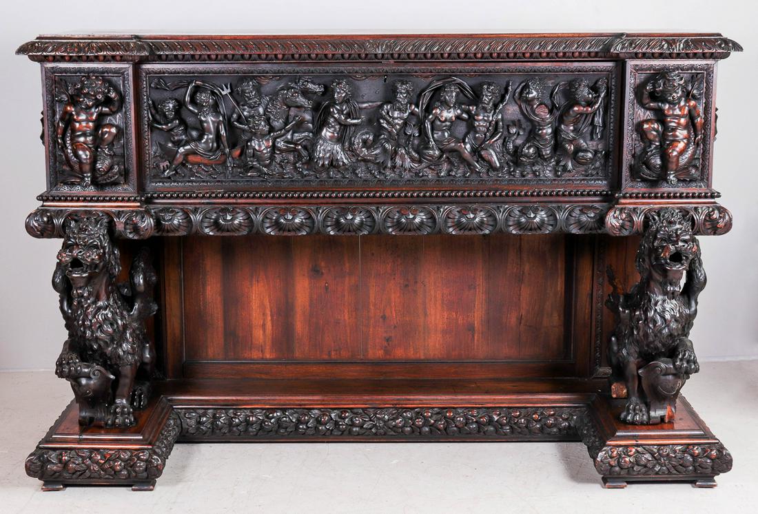 Italian Carved Walnut Baroque Style Cassone, c. 1880: Italian Carved Walnut Baroque Style Cassone, c. 1880, the drop front carved with fables depicting Neptune, flanked by carved putti. Supported on carved winged dragons, the bottom plinth with a bolecti