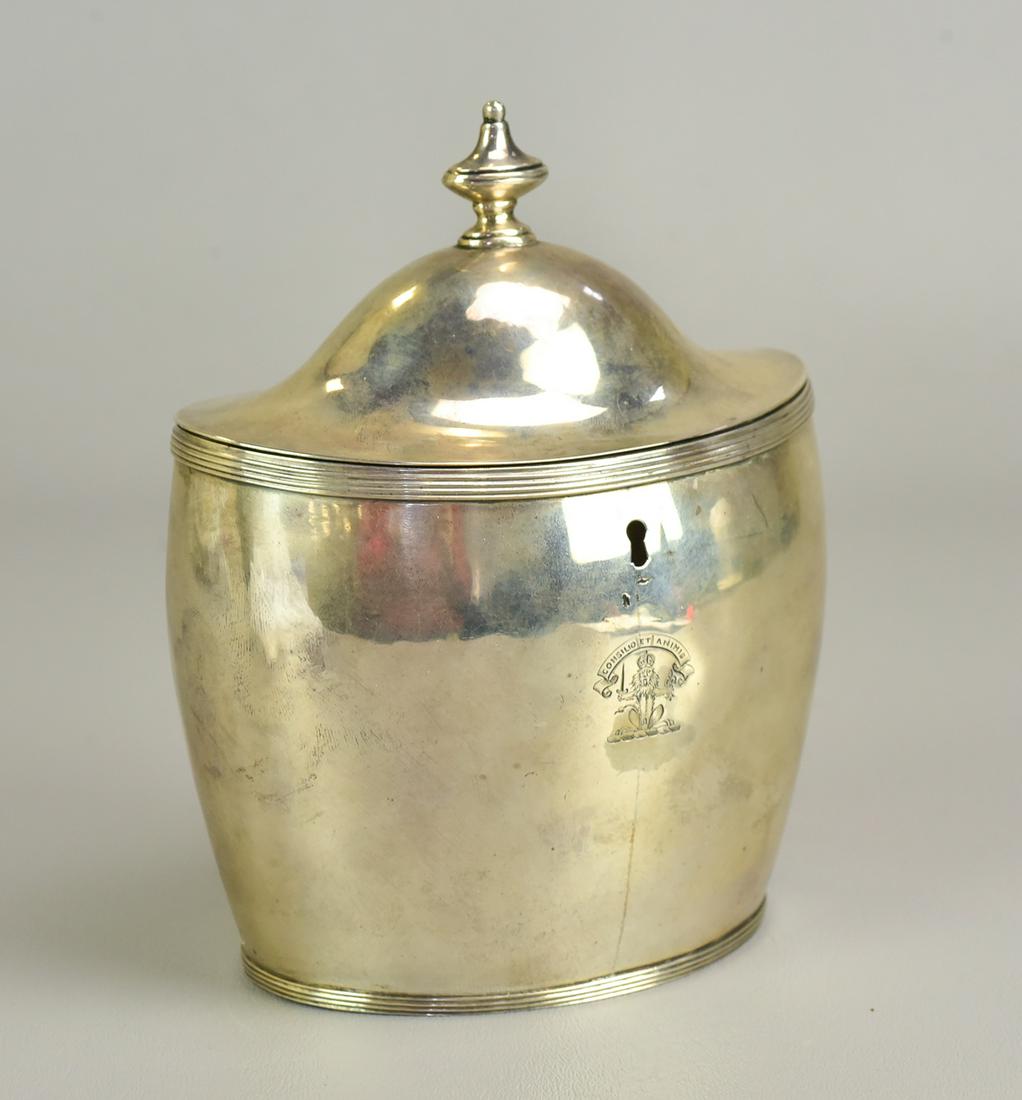 George III Scottish Silver Tea Caddy: George III Scottish Silver Tea Caddy, William & Patrick Cunningham, Edinburgh, 1797, oval form with straight sides, featuring a hinged locking dome lid with finial; decorative stringing at the top and