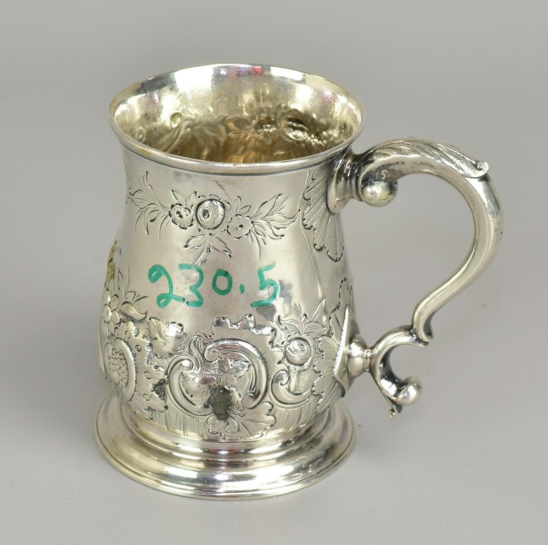 George III English Silver Cann, Fuller White: George III English Silver Cann, Fuller White, London, 1764, 1/2 pint, baluster form on round, spreading foot; heavily chased repousse decoration; acanthus scroll handle; no monograms, 4" high, 7.4 TO