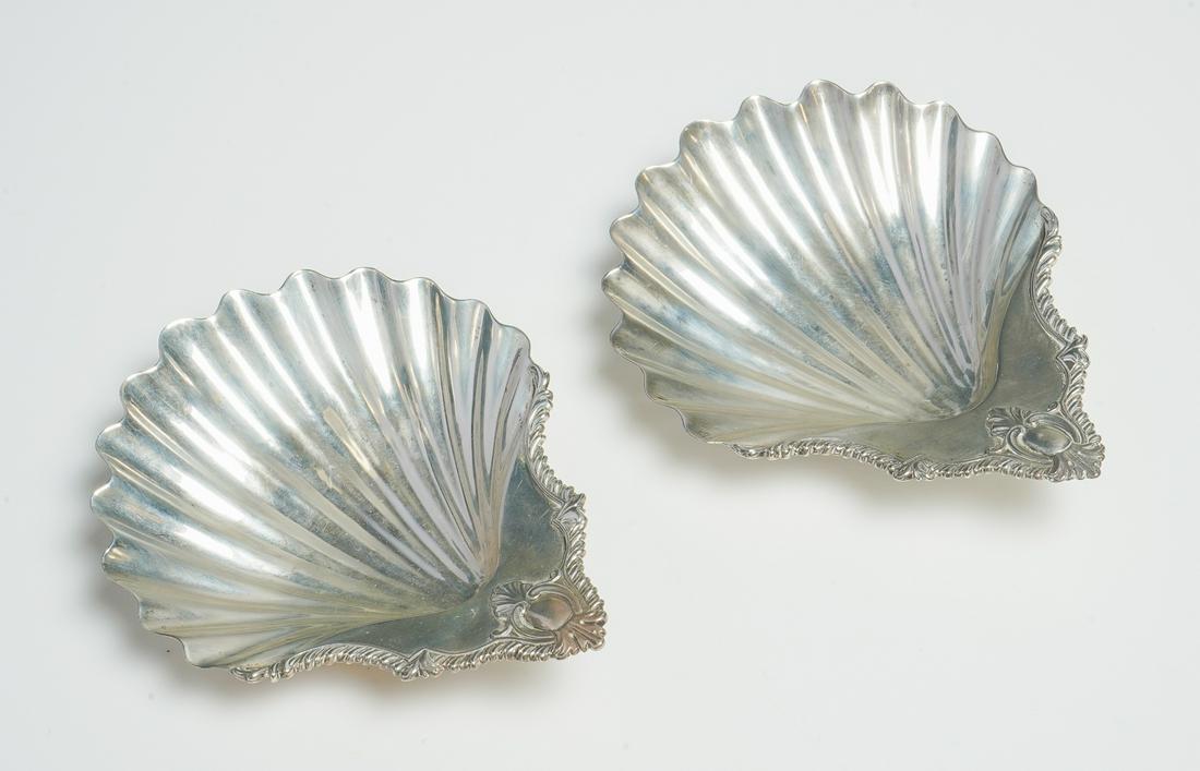 Pr George III silver tri-footed shell dishes: Pr George III silver tri-footed shell dishes, Aldridge & Green, London, 1768, with nautilus shell feet, Hallmarked, Monogrammed, 7.74 TO, Measurements: 1.5" h X 6.25" long X 5.25" d. Provenance: Purch