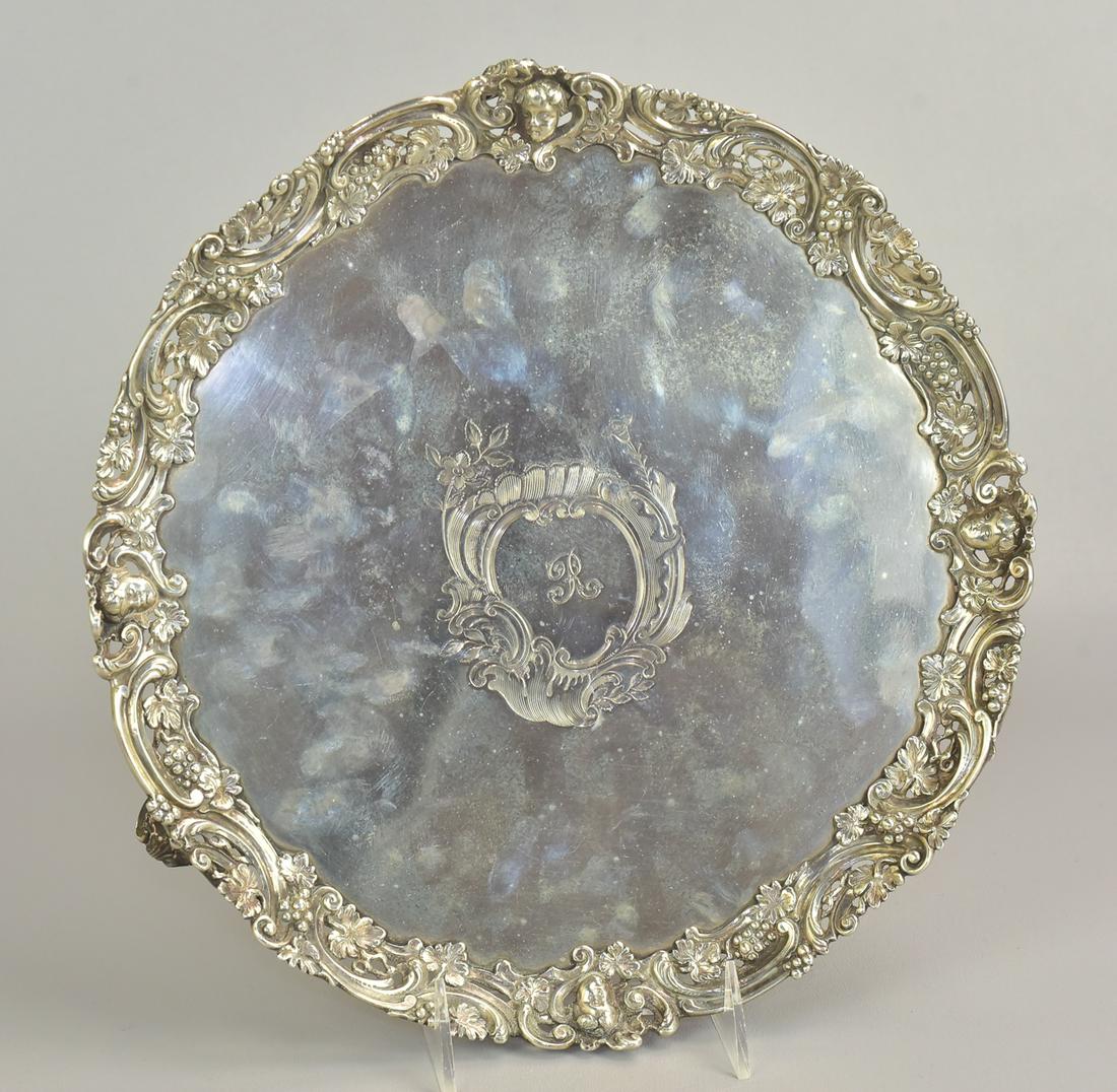 George III Silver Salver, cherub masques: George III Silver Salver, cherub masques and grape leaf motifs on a pierced and scrolled border, Daniel Smith & Robert Sharp, London, c 1761, hallmarked, monogrammed "R", 36.55 TO, 12 1/4" diameter
