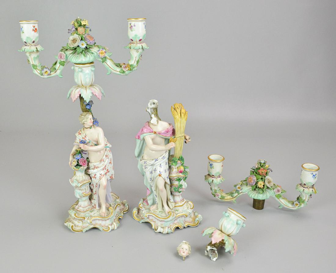 Pair of Meissen two-light candelabra, 1860-1924.: Pair of Meissen two-light candelabra, 1860-1924. Each with blue underglaze crossed swords marks, The example embaltic of spring incised "2100x," OH 14 OW 7 3/4," OD 4." The example emblematic of autum