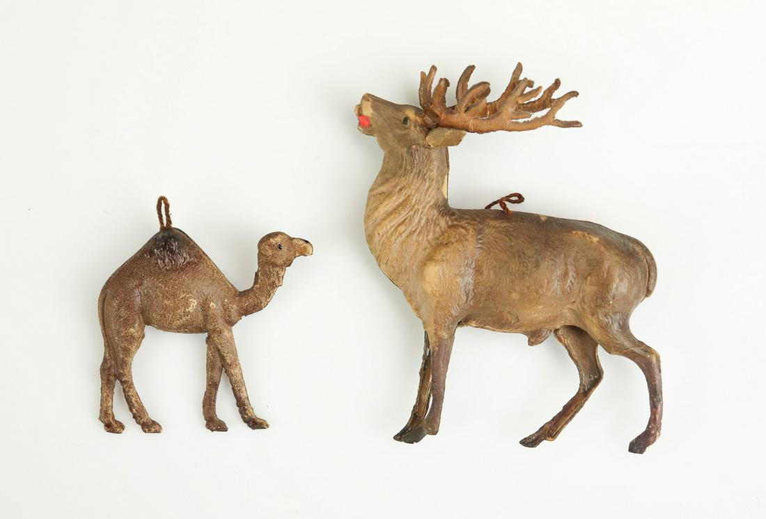 Dresden Camel and Reindeer Ornaments: Dresden camel and reindeer ornaments to include camel ornament, 2" L, and reindeer with antlers and opened mouth with head back, 3-1/4", both German, 1900's