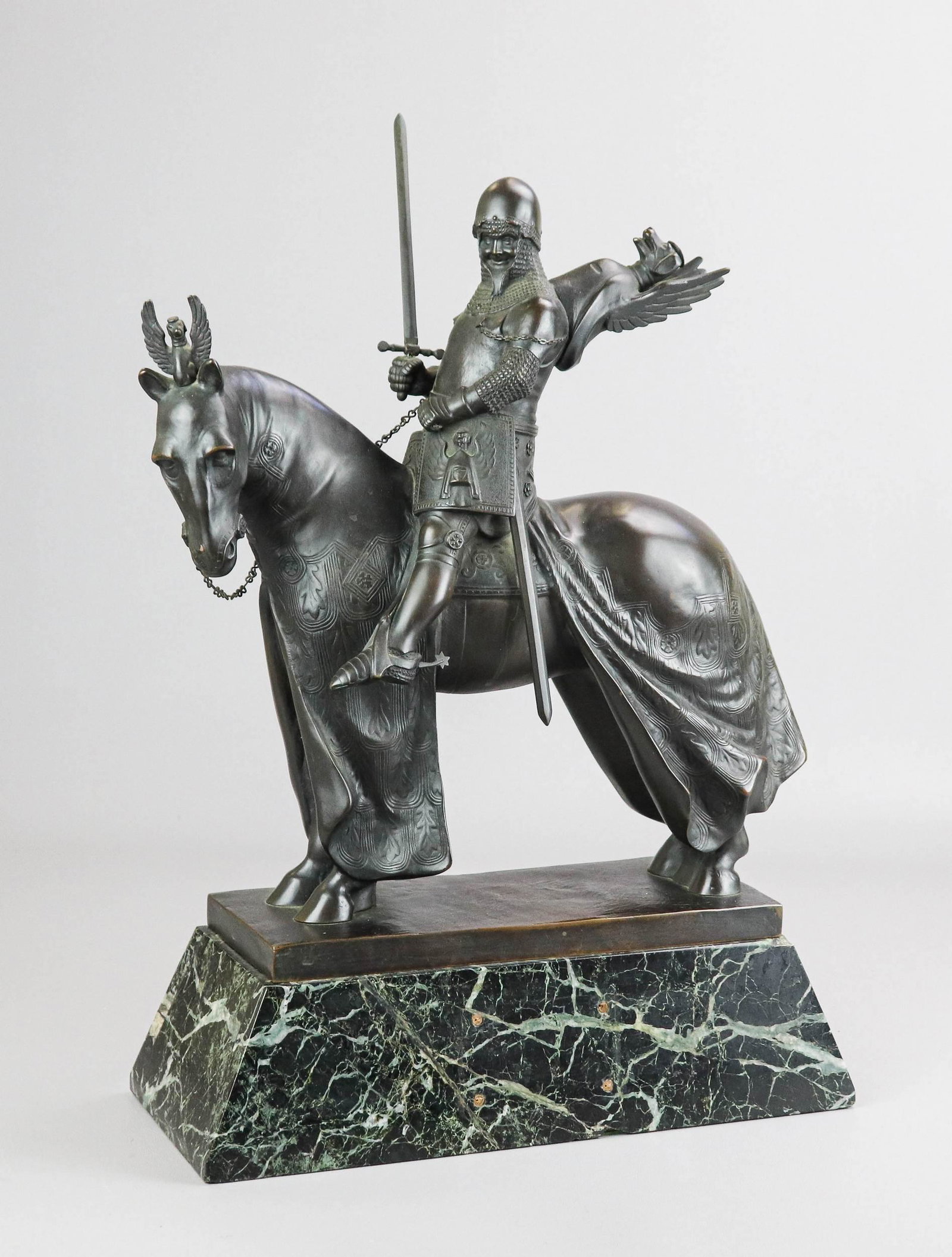 Hans Muller "Cangrande" Equestrian Sculpture: Hans Muller (Austrian, 1873-1937) Equestian Bronze of Italian Nobleman, Cangrande, "Reiter Statuette de Cangrande Della Scala", patinated bronze on gree marble base, signed "H. Muller red.", meassures