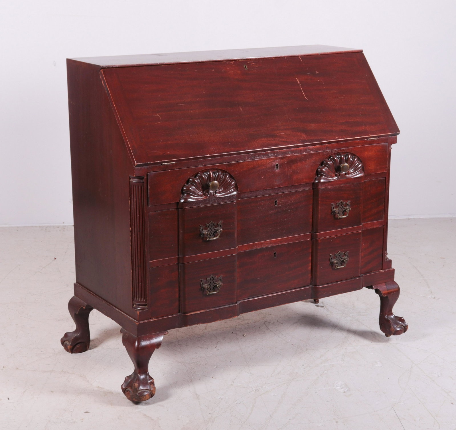 Mahogany Chippendale style slant front desk: Mahogany Chippendale style slant front desk, fitted interior over 3 drawers, 41-1/2"h x 40-1/2"w, wear and scratches