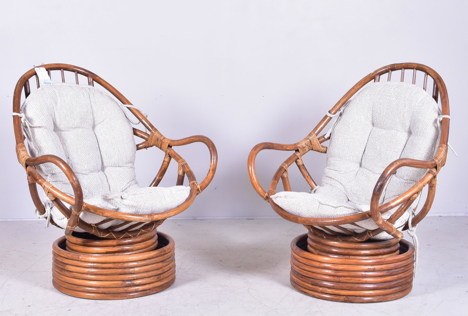 Pair Fort Smith Chair Co Bamboo wrapped lounge chairs: Pair Fort Smith Chair Co Bamboo wrapped lounge chairs, tufted cushion, 38"h, seat height to top of cushion 20"h