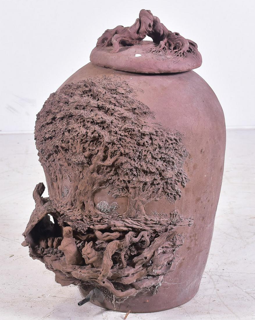 Redware lidded garden pot w/ tree decoration and: Redware lidded garden pot w/ tree decoration and rabbits, aerator at base, 29"h x 17"diameter