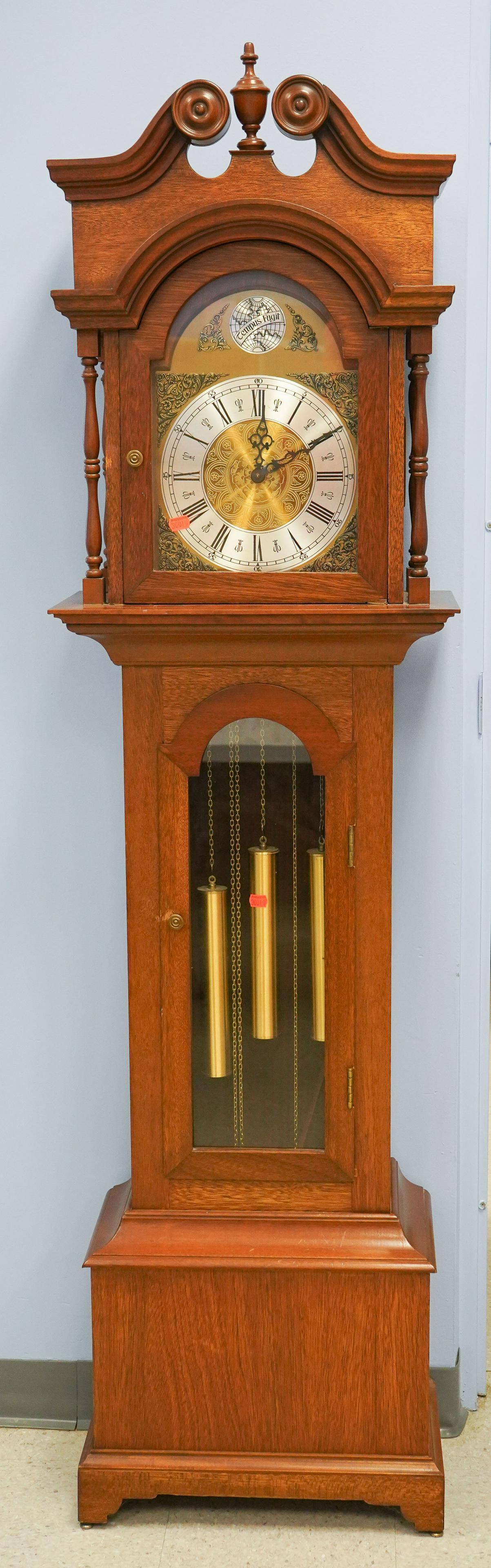 Modern Mahogany Hall Clock: Modern Mahogany Hall Clock, 3 weight pull chain German movement, unsigned, 74 1/2" tall, hinges need pins