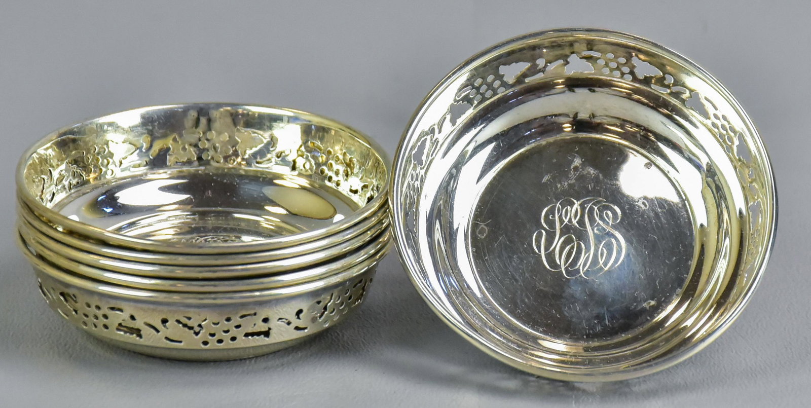 (6) BB&B Sterling Silver Nut Dishes: (6) Bailey Banks & Biddle sterling silver nut dishes, reticulated grape cluster border, 3-letter monogram, 3.97 TO