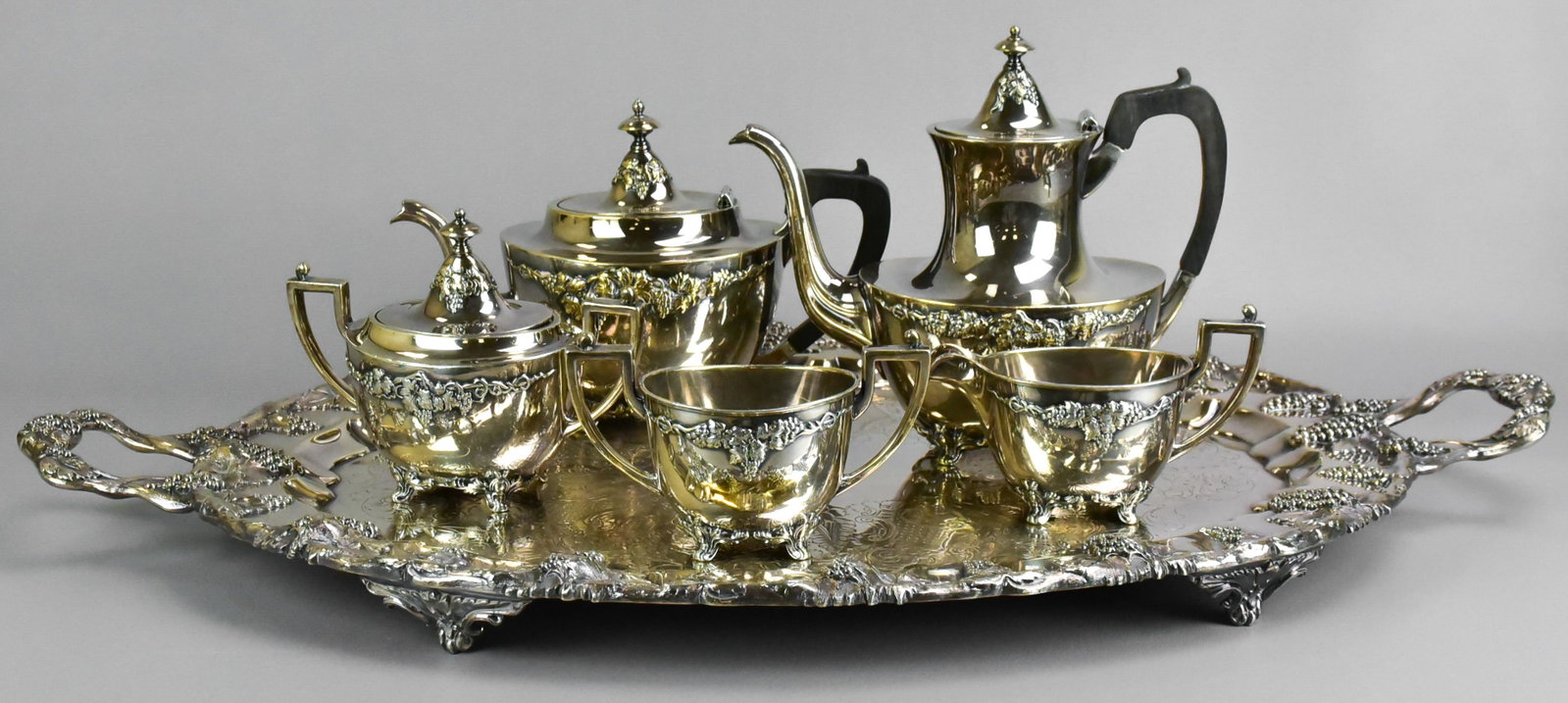 6-Piece Derby Silver Co Silver Plate Tea Set: 6-Piece Derby Silver Co quadruple plate tea set, 1603, applied grape cluster & vine pattern, c/o teapot, coffee pot, sugar, creamer, waste bowl, double handled footed tray