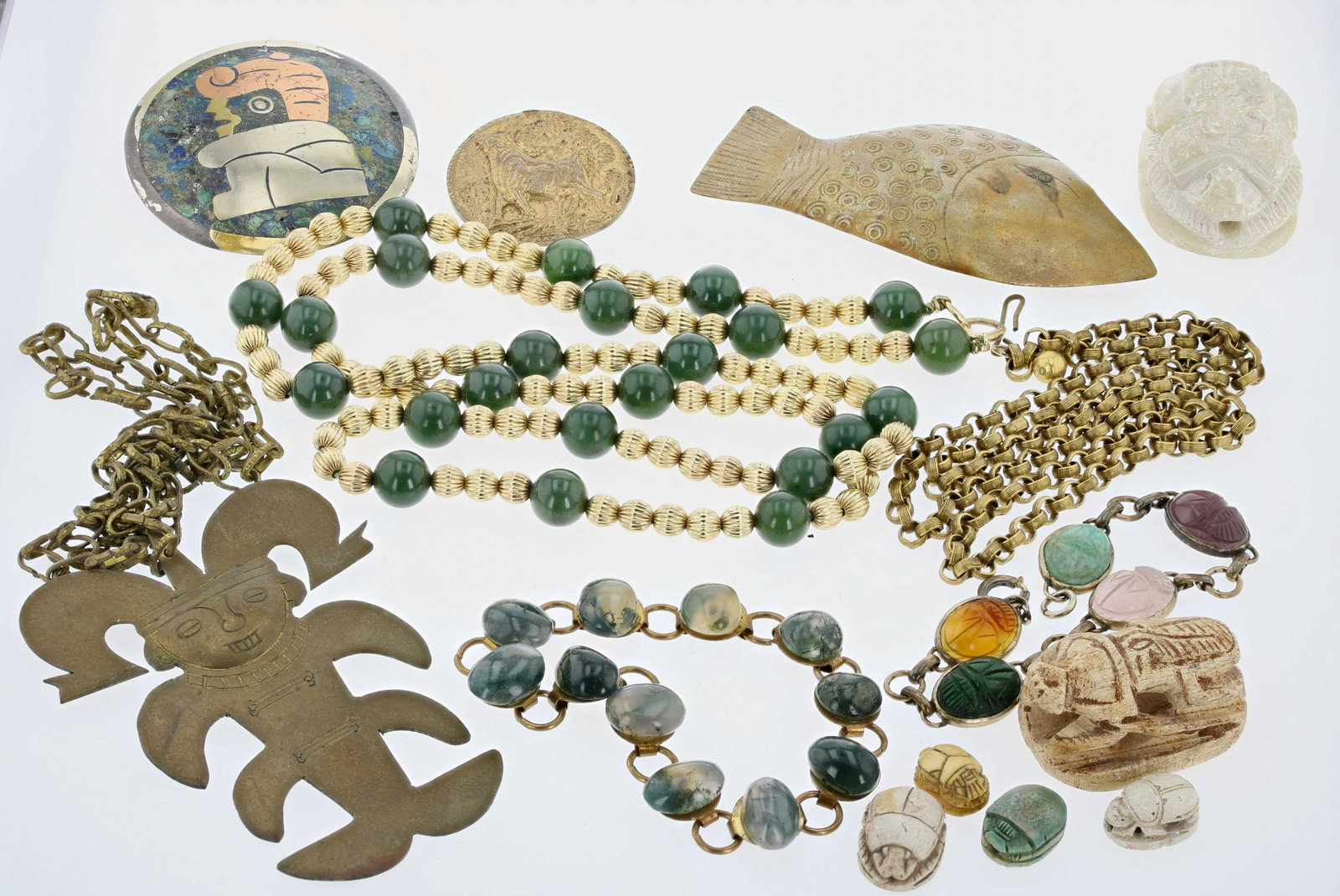 Mid Century Jewelry Lot: Mid Century Jewelry Lot C/O: (1) 3.5" Brass Fish brooch, signed Roggio;(6) carved scarab beetles, (1) 3"brass Peruvian inca figure necklace, (1) Copper and silver brooch/Pendant signed made in Mexico;