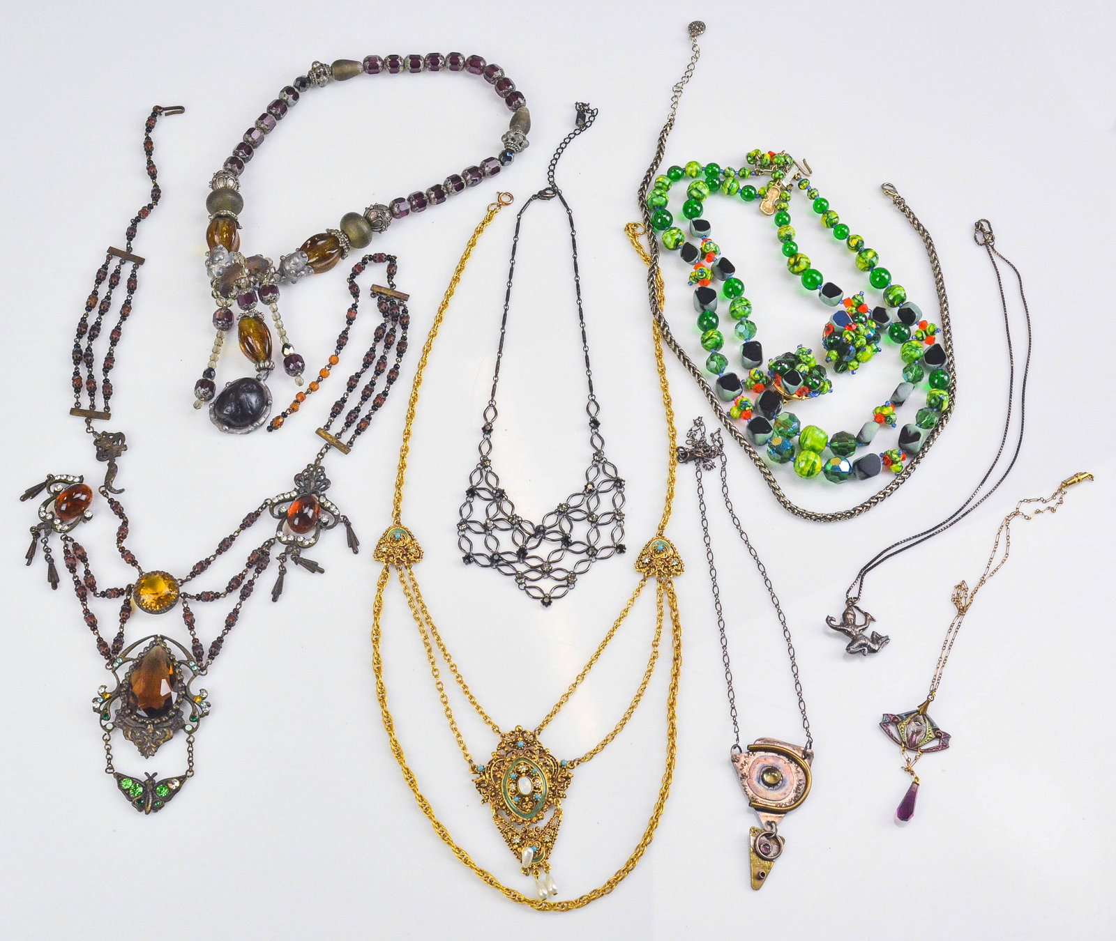 Costume Necklaces: (9) Costume Jewelry Necklaces, one with earrings, one marked Maya, one Fiorenza, longest 28"