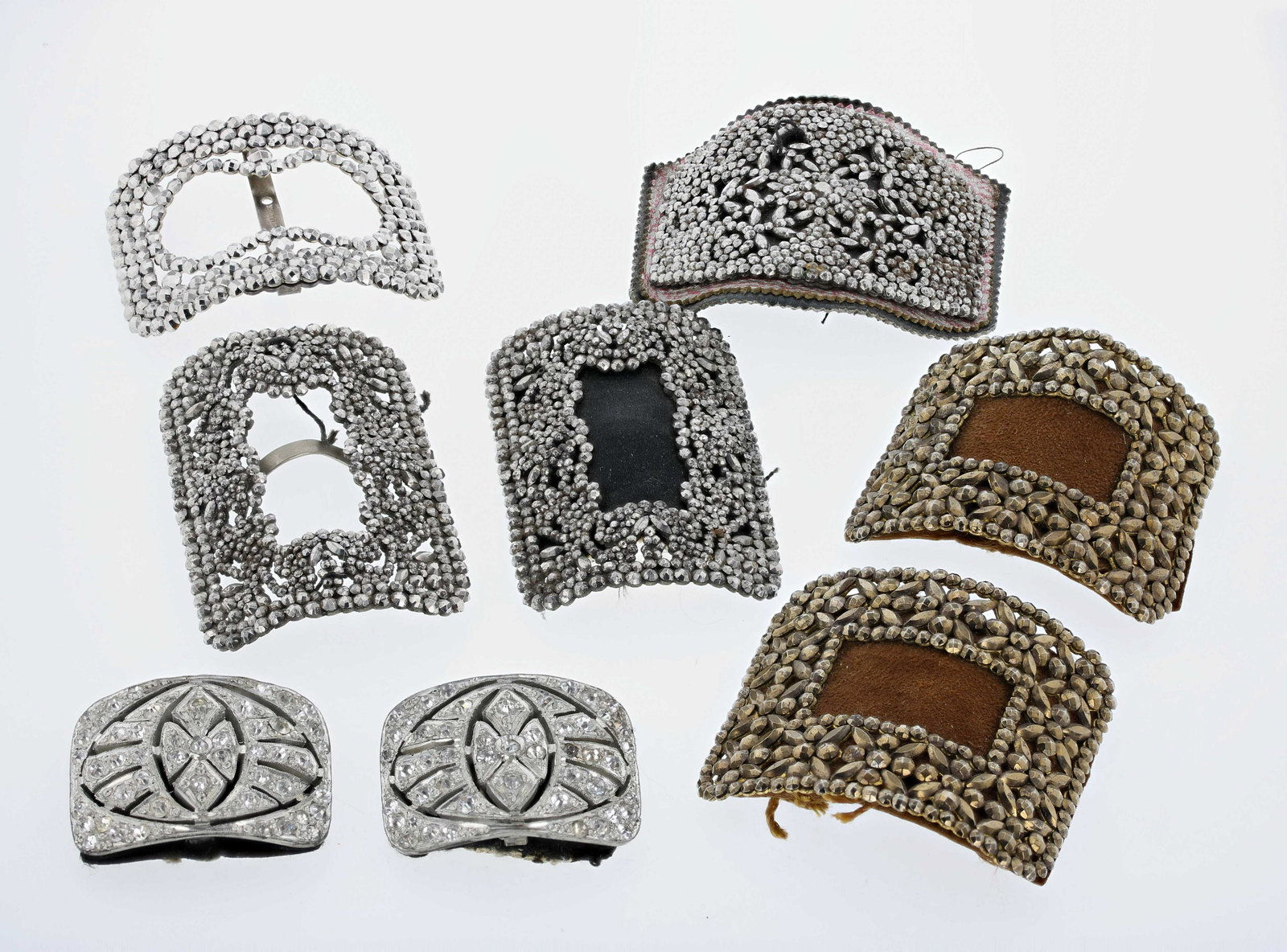 Antique Shoe Buckles Clips: (1) pair of cut steel shoe buckles 2.5x2" (1) pair of brown cut steel shoe buckles with brown suede buckram (1) Exquisite pair if art deco evening shoe buckle wear, made in metal possibly steel, in VE