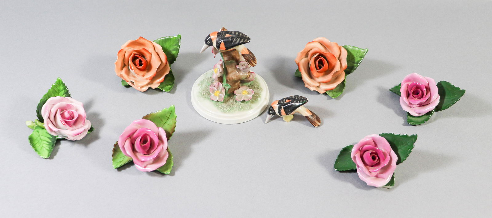 (7) Pcs Herend Porcelain: (7) Pcs Herend porcelain, c/o (4) pink roses place card holders (one with break & chip), (2) peach rose place card holders (one with chips), blackbirds figurine 5129 (needs repair)