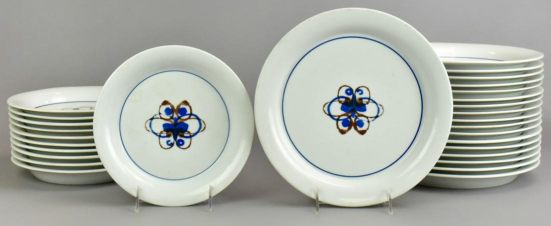 (29) Pcs Dansk Designs Austria in 'Genesis': (29) Pcs Dansk Designs Austria in 'Genesis' to include (18) 10-1/4" plates and (11) 8-1/4" salad plates, all in matched abstract cobalt and brown decorated center with cobalt inner rim, some utensil m