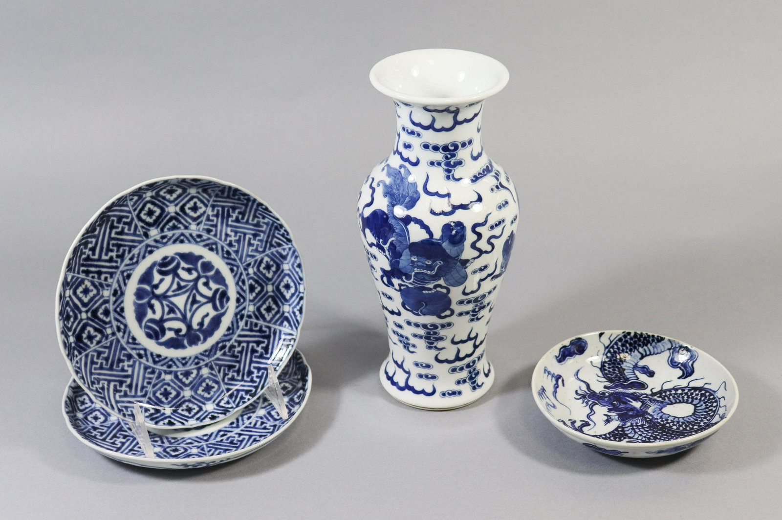 (4) Pcs Chinese Blue & White Porcelain: (4) Pcs Chinese blue & white porcelain, c/o dragon decorated vase with double blue ring to base, shallow bowl, pair of plates with 6-character mark to base, tallest 9-1/4"
