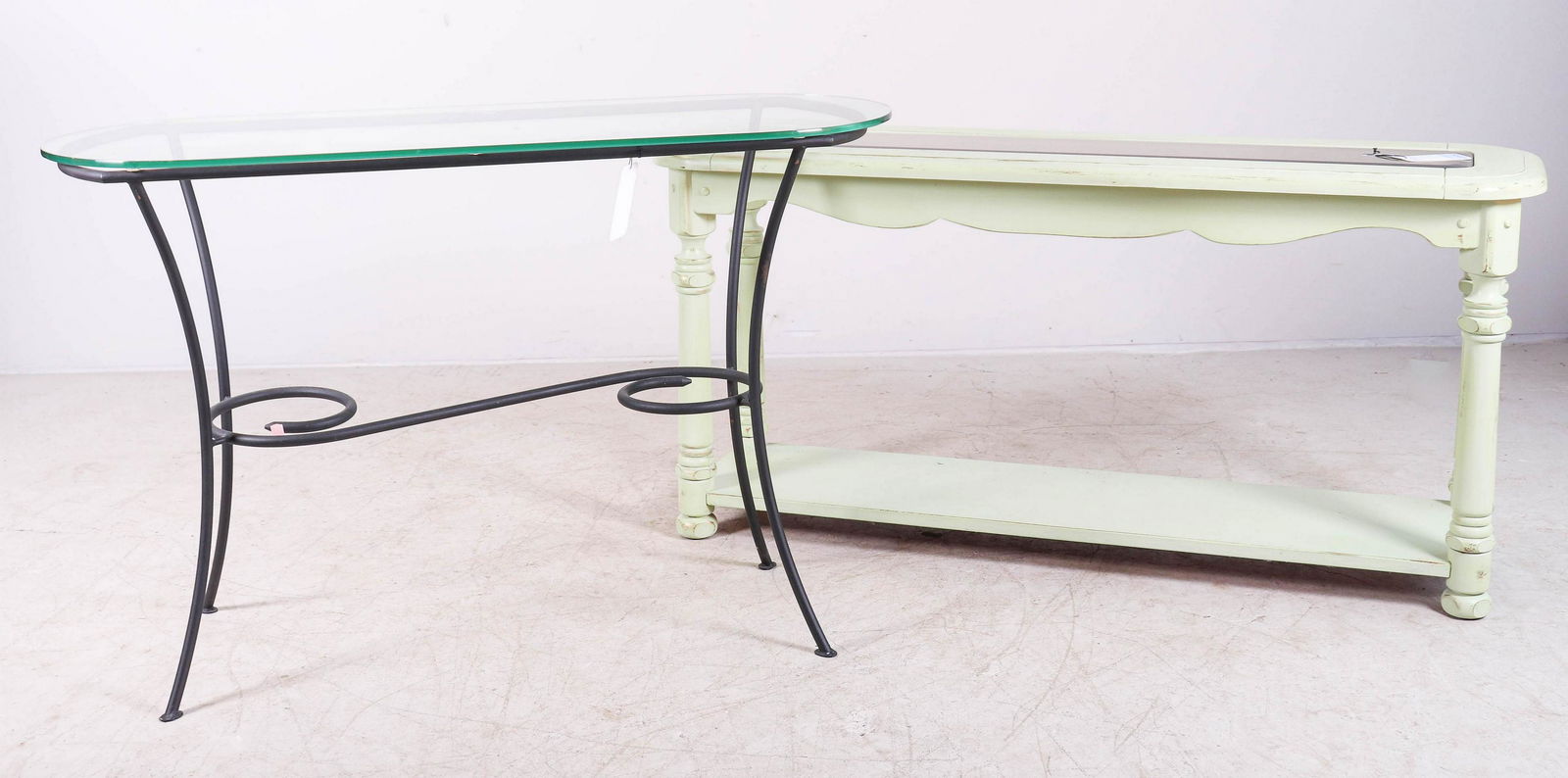 (2) Glass Top console tables: (2) Glass Top console tables, c/o black metal glass top console table, green painted 2-tier console table with glass insert, largest 26"h x 53"w