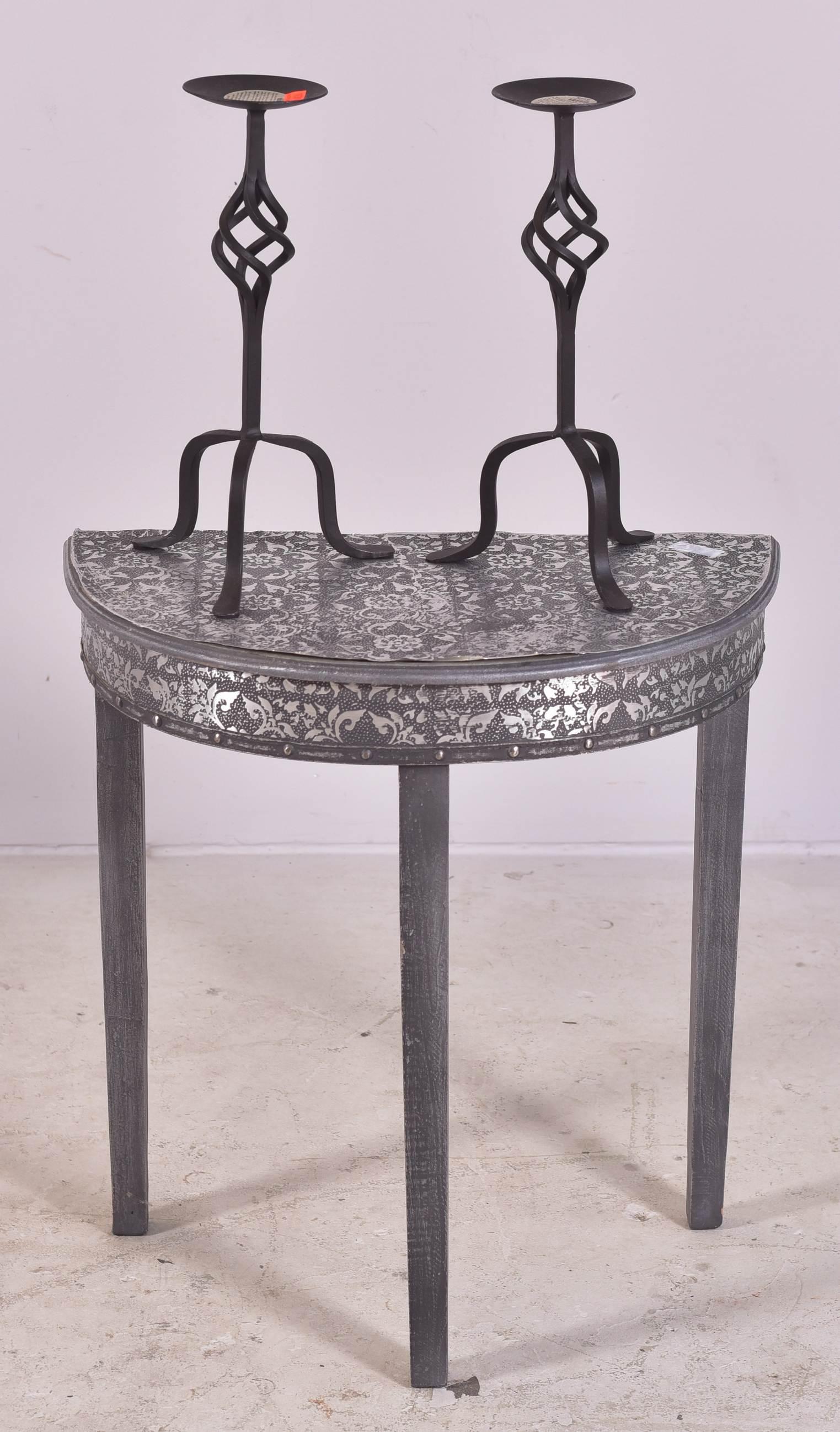 Embossed tin metal console table: Embossed tin metal console table, along with pair iron candleholders, console 20"h x 25"w, some pulling back of embossment