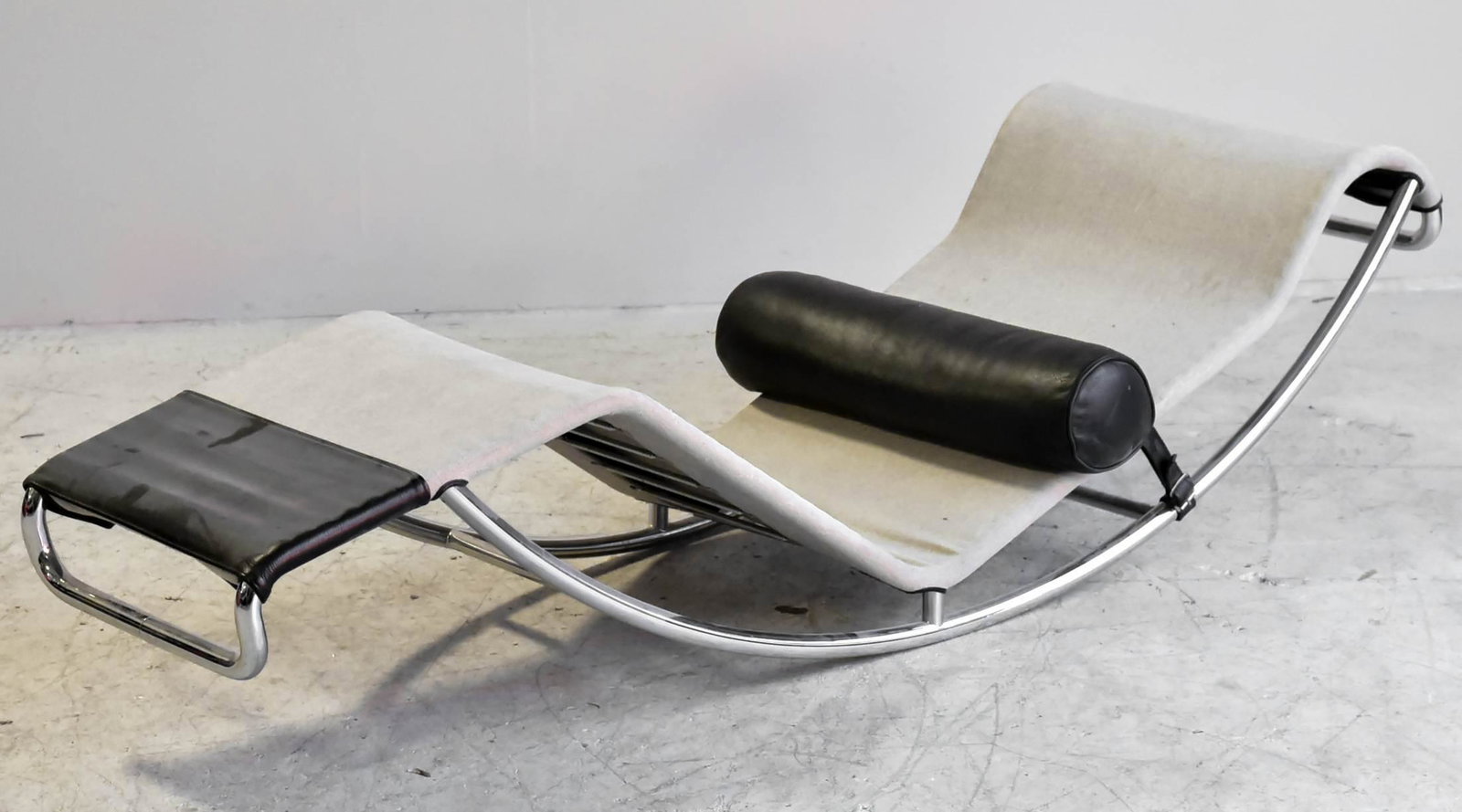 Modern Design rocking chaise lounge: Modern Design rocking chaise lounge, chrome frame, camel and black upholstered, 22"w x 64"d x Height 23"h