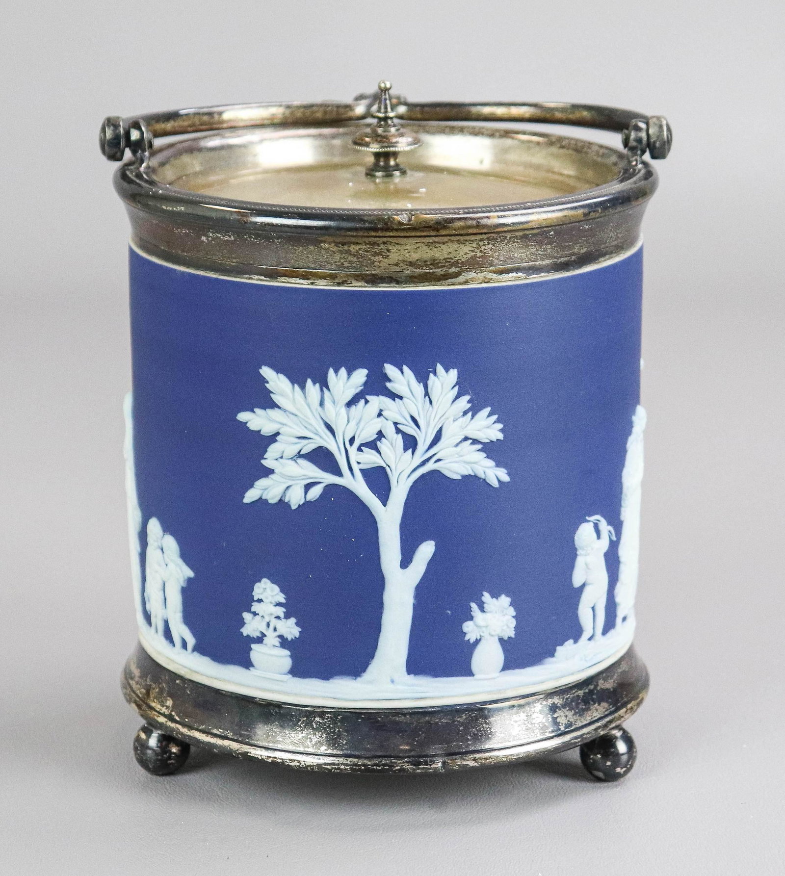 Wedgwood England Blue Dip Biscuit Barrel: Wedgwood England blue dip biscuit barrel raised on silverplate foot, silverplate rim, handle and lid, 1890's, 6" h, 5-1/2" diam
