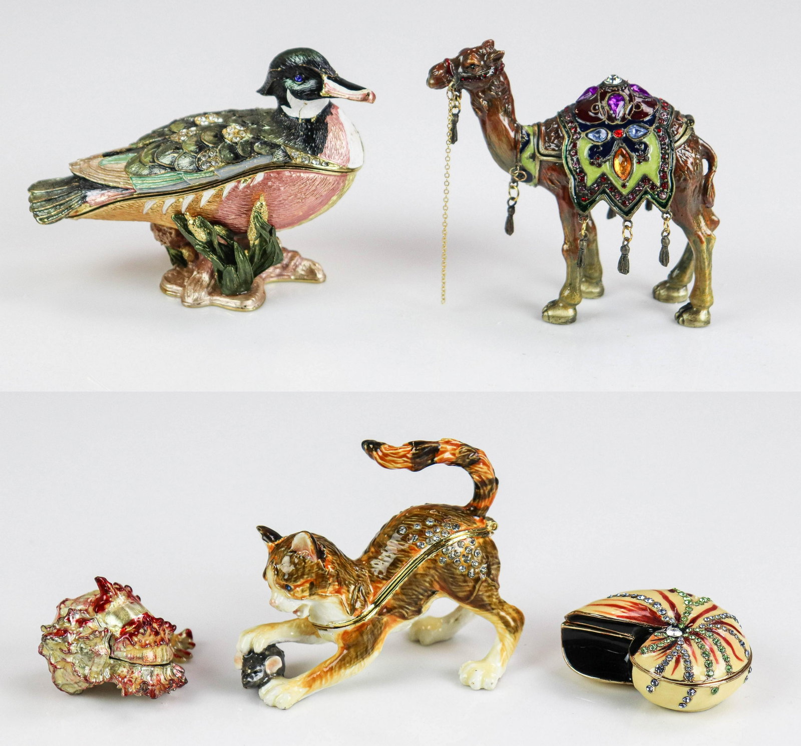 (5) Jere and Style Enamel Trinket Boxes: (5) Jere and style trinket boxes to include Jere cat with mouse under paw, Jere duck in reeds and Jere tassel decorated camel, all animals in enamel paint with gem decoration, opening to reveal matche