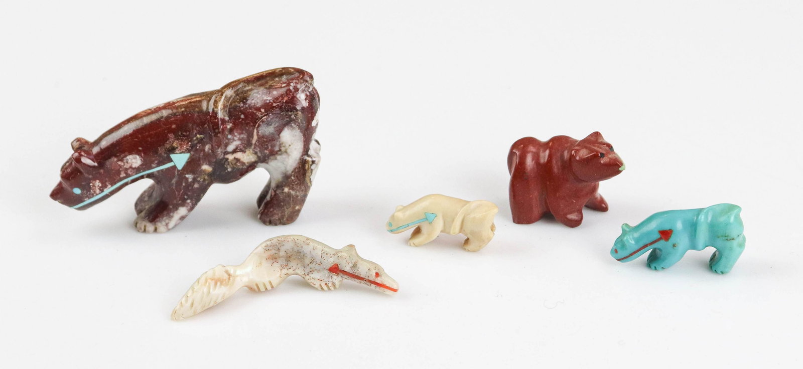 (5) Andres Quandelacy and Style Zuni Fetishes: (5) Andres Quandelacy and style Zuni fetishes to include AQ magnesite mountain lion fetish with inlaid turquoise,3" L, style pipestone or jasper bear with inlaid turquoise, 1-1/4" L, style turquoise m