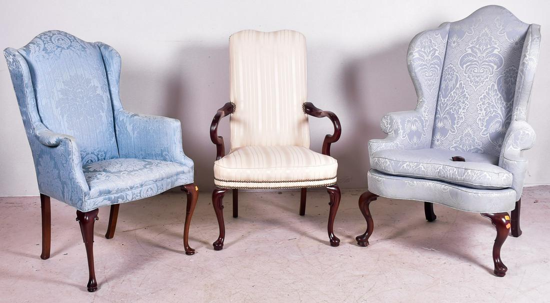 (2) QA style wing chairs and QA style armchair: (2) QA style wing chairs and QA style armchair, c/o one wing chair with Kittinger tag, both with blue damask upholstery, armchair with cream striped upholstery marked Statesville, largest 51"h, seat h