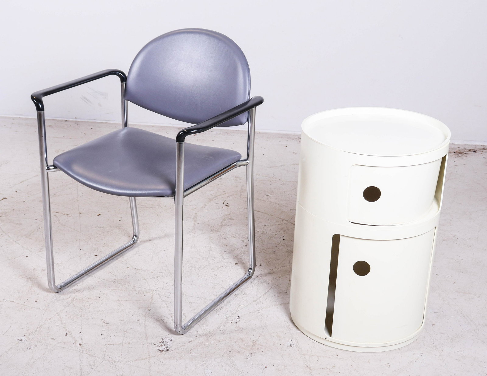 KI Modern Design chrome armchair, Kartell 2-tier: KI Modern Design chrome armchair, along with Kartell 2-tier stackable side table with sliding doors, largest 30-1/2"h, seat height 17"h