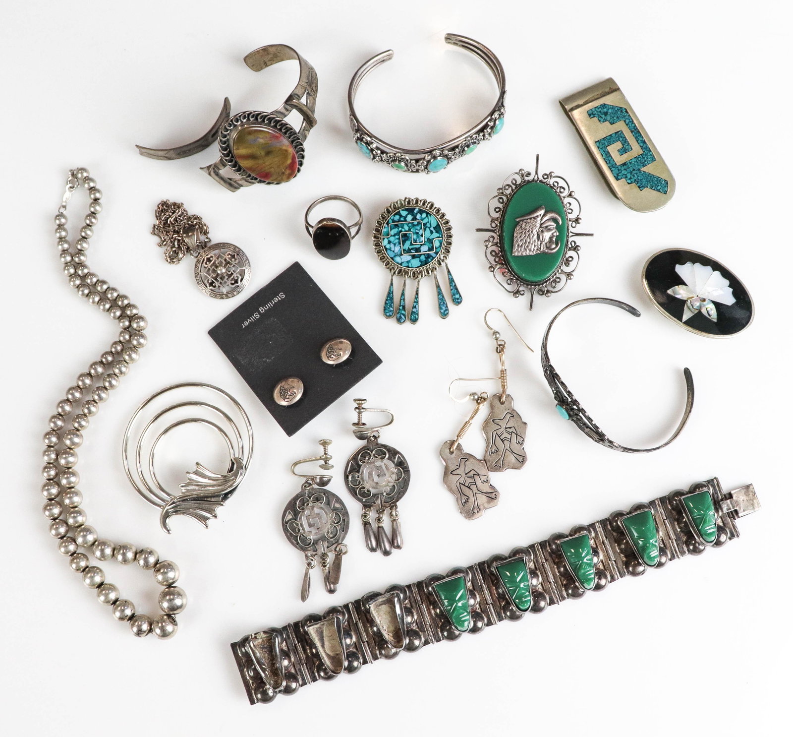 South Western Sterling Silver Jewelry Lot: South western Sterling Silver Jewelry Lot C/O: (3) cuff bracelets, one broken, 2 signed sterling, (1) Made in Mexico panel bracelet missing parts 7" long; (1) 18" bead chain, (3) sets of earrings, two