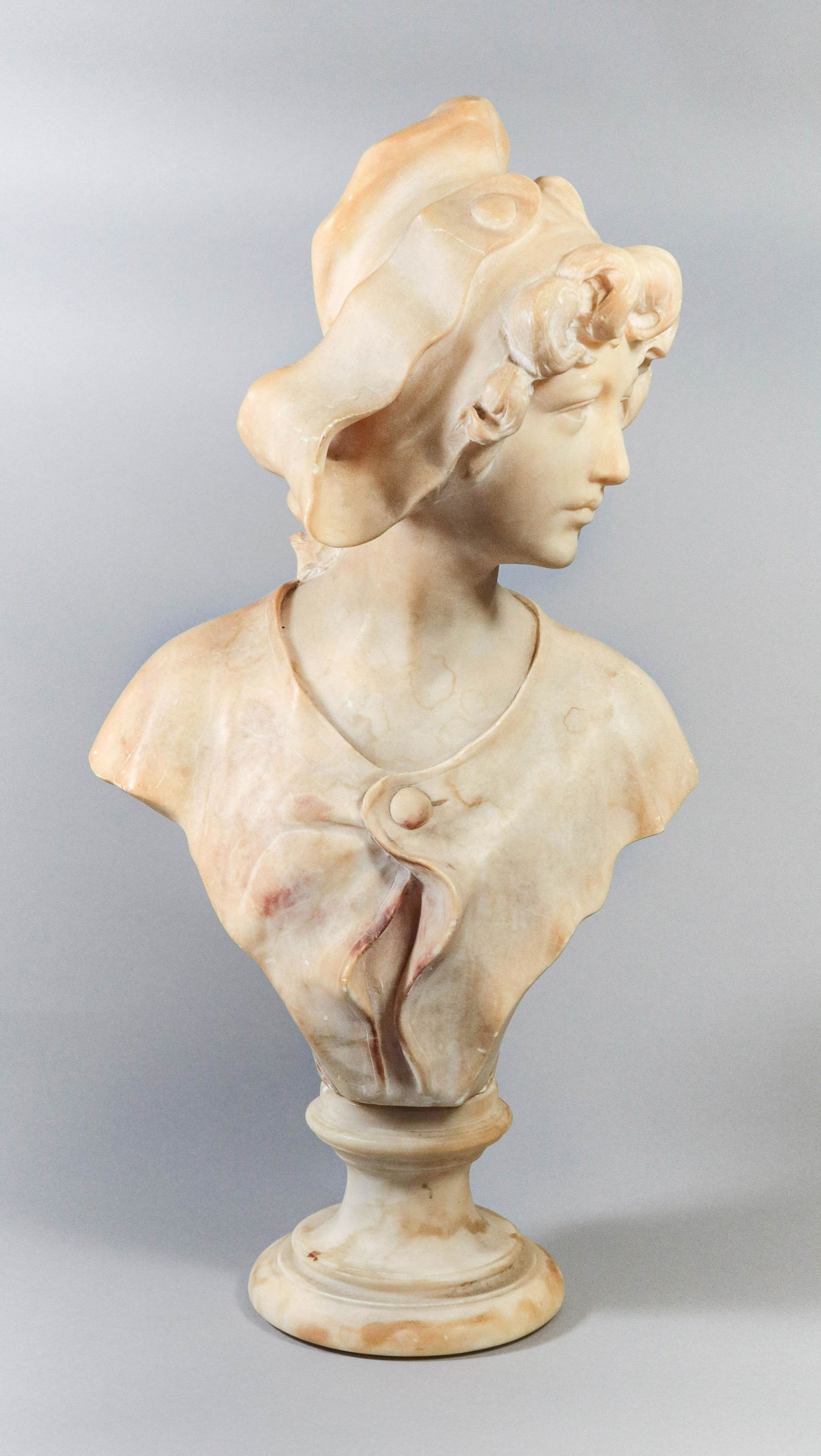 Carved Alabaster Bust of a Female: Carved alabaster bust of female, signed 'Cipriani' at back, with repair, 21" H