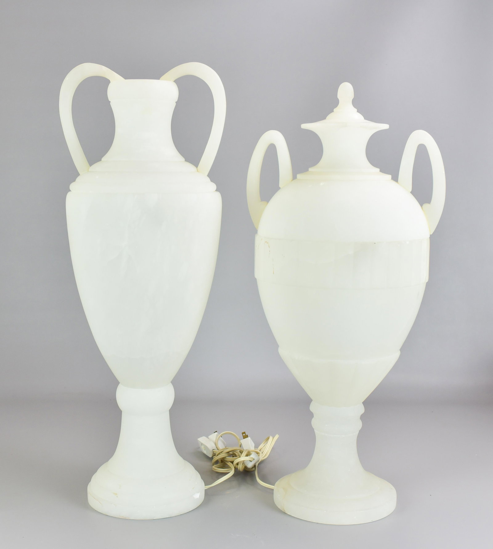 (2) Alabaster Urn Table Lamps: (2) Alabaster urn table lamps, largest 26" h, some chips around rim
