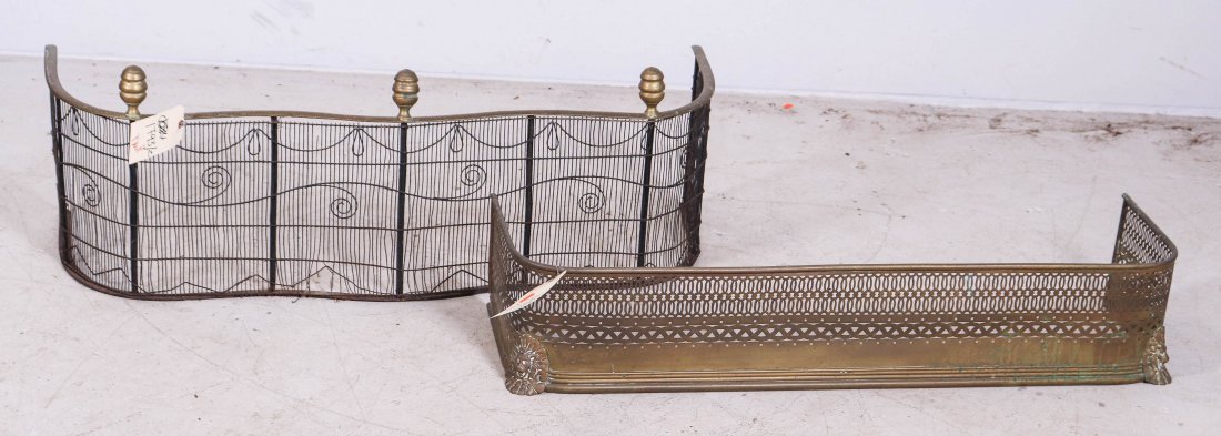 (2) brass fireplace fenders: (2) brass fireplace fenders, largest 47"l, Surface rusting, pitting and green patina to finials. Brass rail is flat around top. Small damage to inside of rail and three broken wires at bottom center