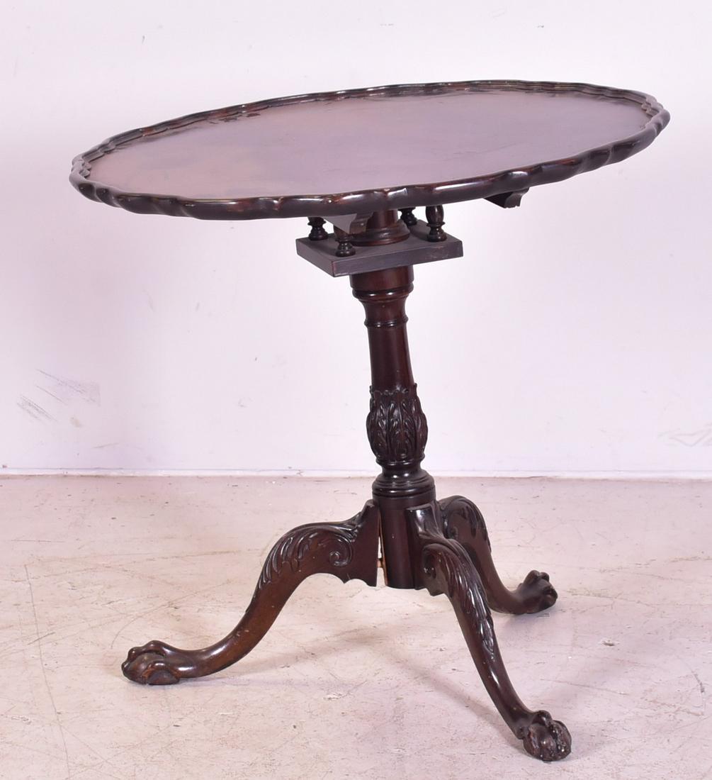 Mahogany Chippendale flip top table: Mahogany Chippendale style birdcage tea table, pie crust top, ball and claw feet, 29"h x 28-1/2"diameter