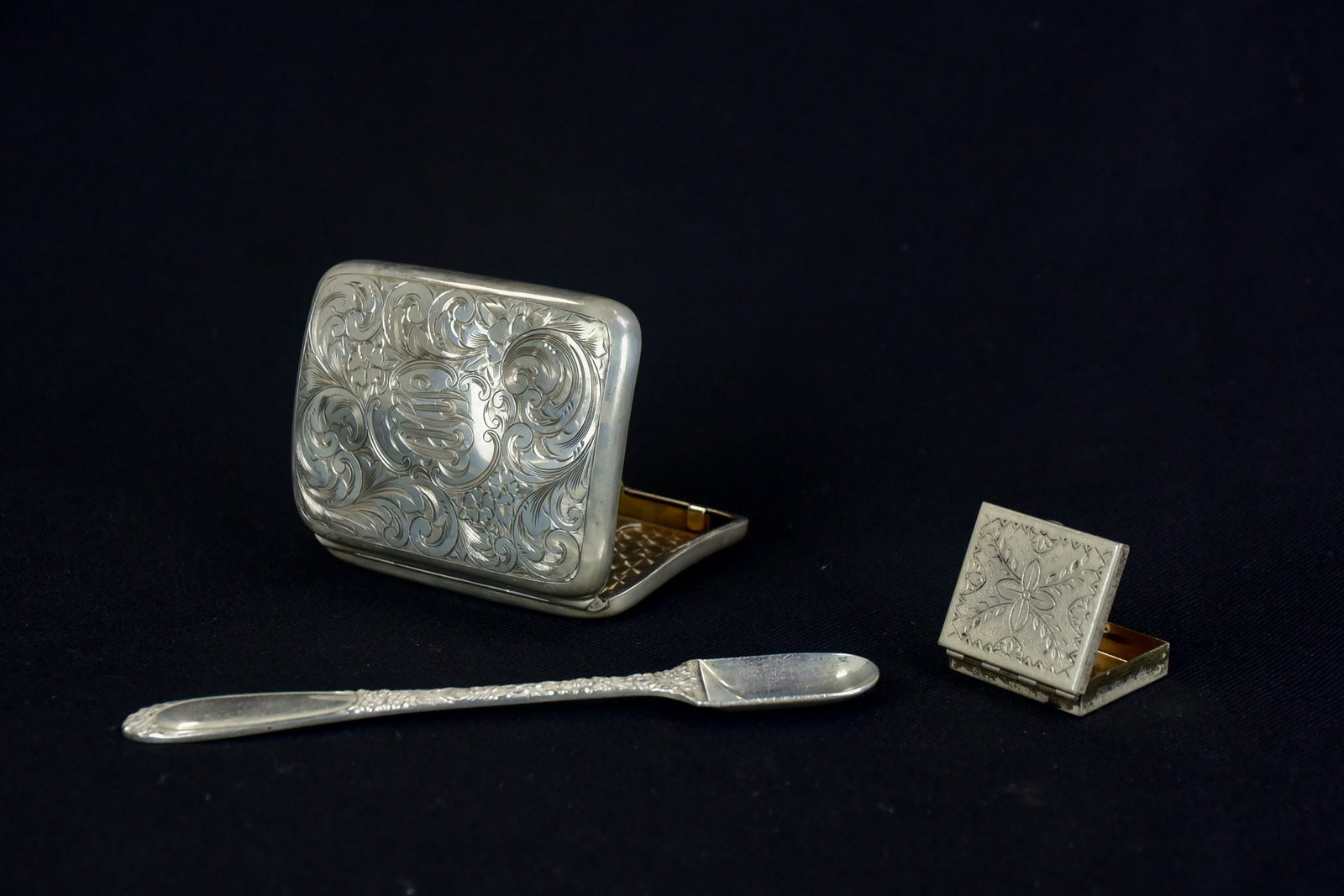 Stieff Sterling Medicine Spoon, Case and Pill Box: Stieff sterling medicine spoon, case and pill box to include sterling rose decorated medicine spoon, 5-5/8" etched floral sterling case, 3-1/4" L dent to front and sterling pill box, 1-1/8"x1-1/4", 3.