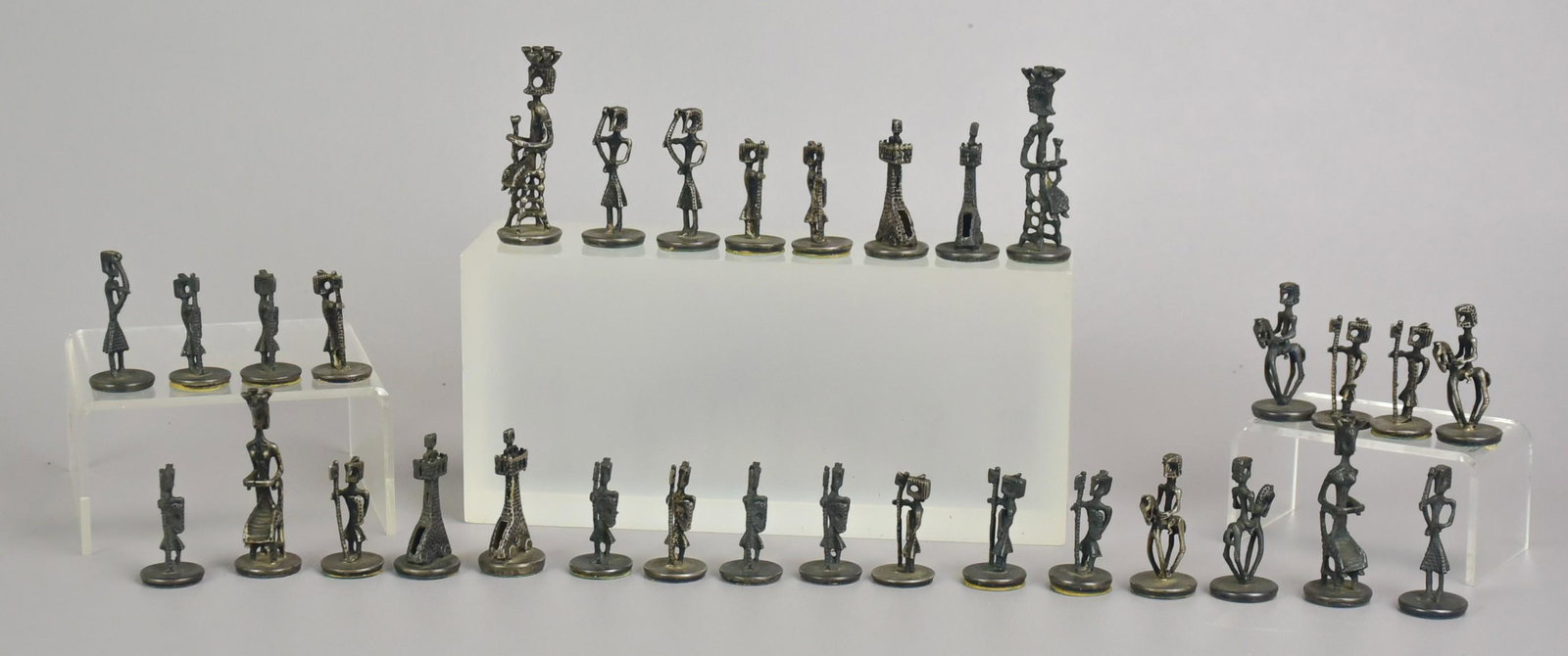 Aharon Bezalel Sterling Chess Set: Complete mid-century modernist chess set, (32) pieces, weighted sterling silver, made by J. Bier of Jerusalem, cast from models created by sculptor Aharon Bezalel (1925-2012), marked "Israel 925", tal