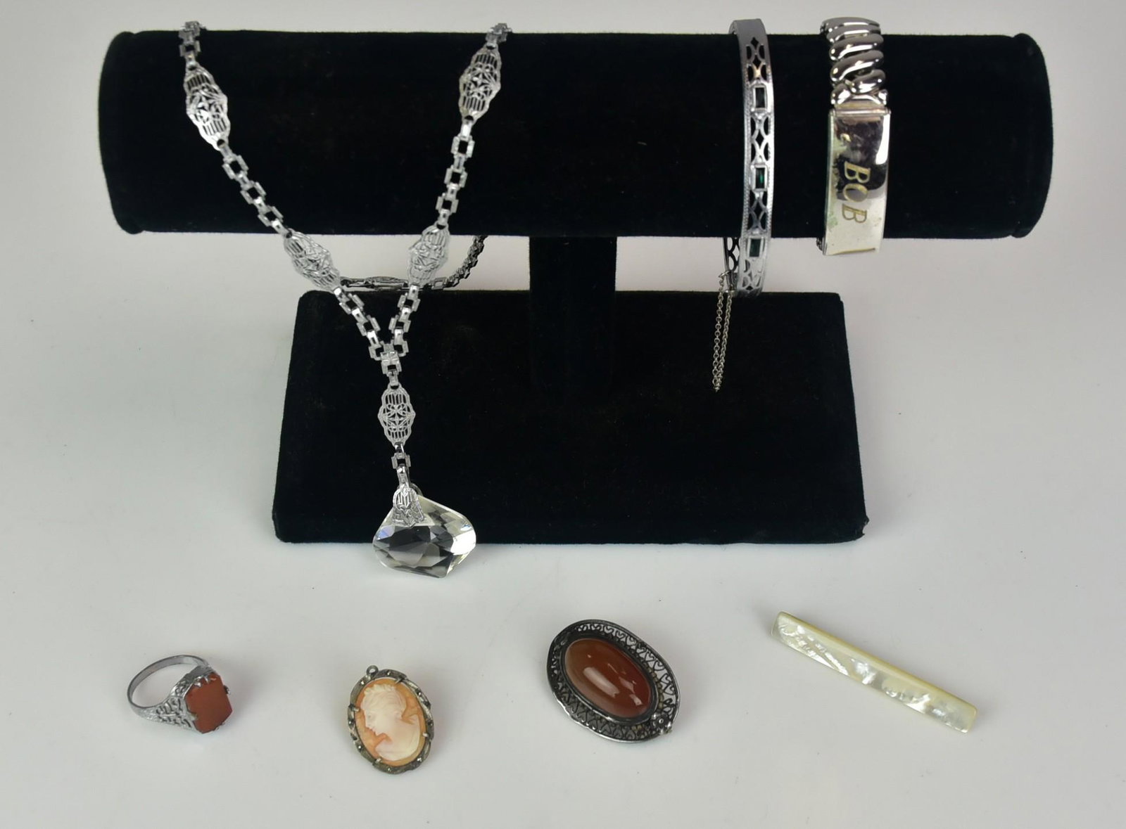Vintage Jewelry Lot: Vintage Jewelry Lot C/O; (1) sterling top stretch ID bracelet, (1) sterling agate pin, (1) matching filigree ring, (1) MOP bar pin, silver crystal drop pendant; (1) silver tone bangle bracelet set wit
